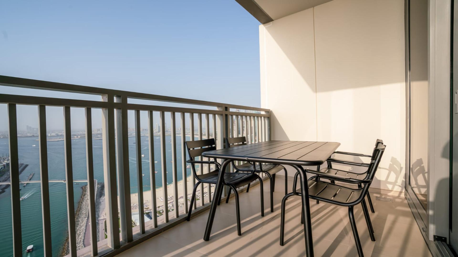 Modern living room in 52 42 Tower apartment, Dubai Marina, featuring sleek furniture