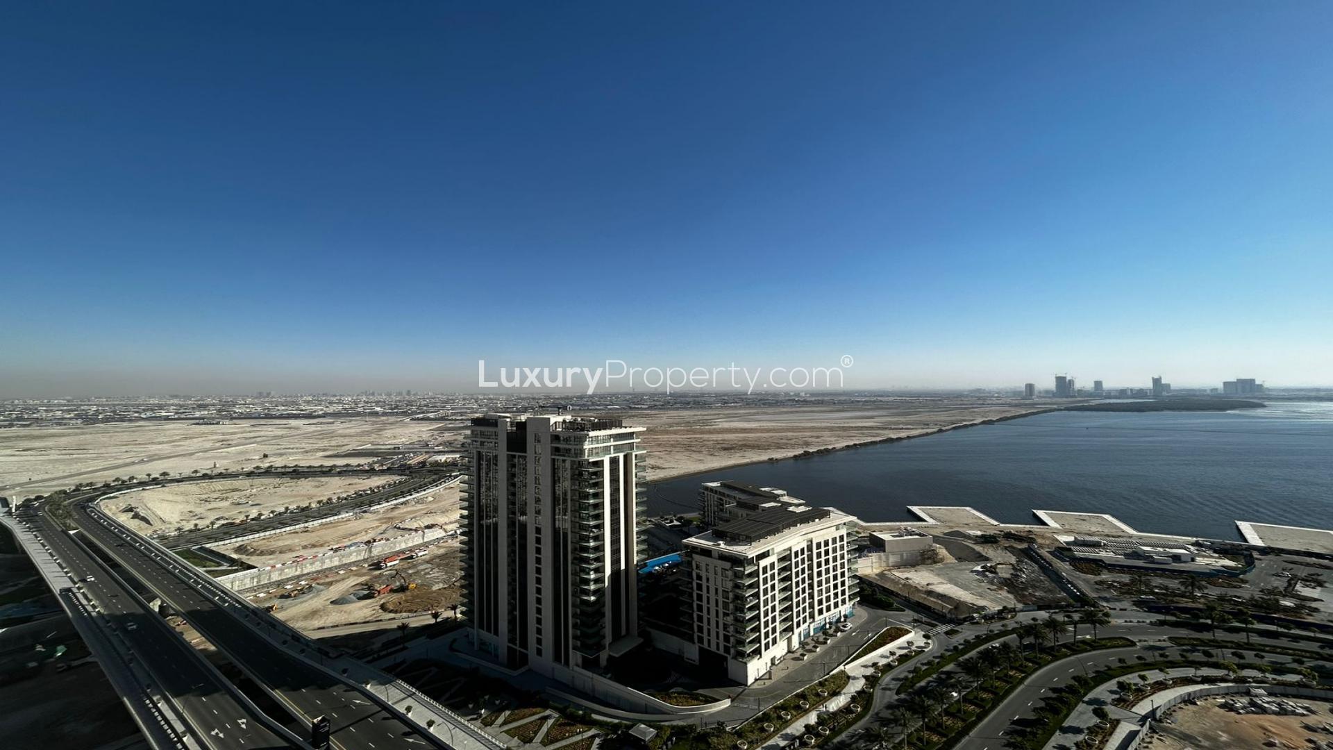 Empty apartment room with balcony, offering skyline views in 17 Icon Bay, Business Bay