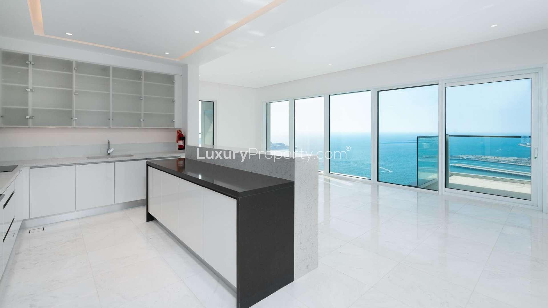 Luxurious 2-bedroom apartment balcony view overlooking Jumeirah Beach and Ferris wheel, 1 JBR