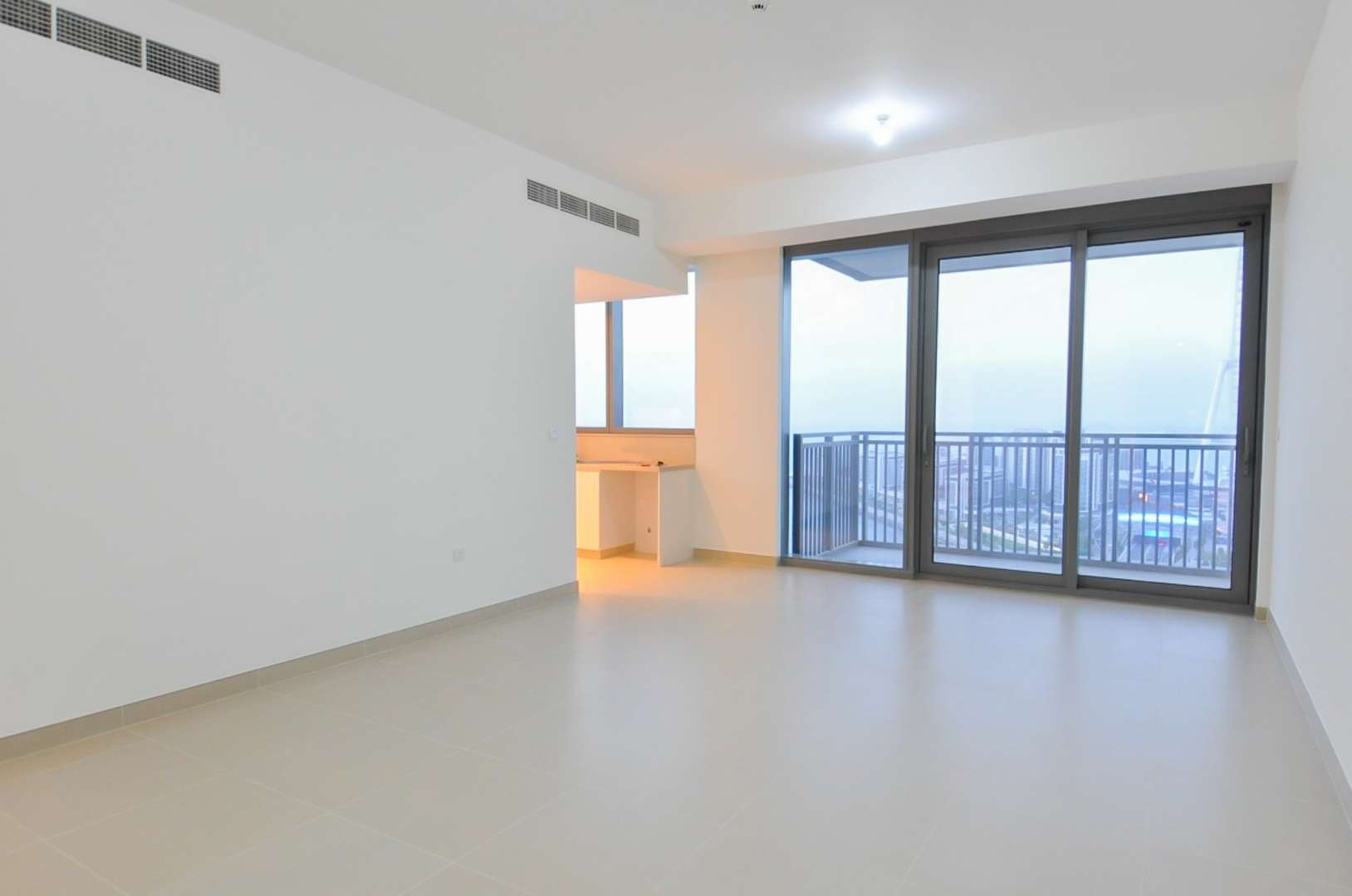 "Stunning sea view from Dubai Marina apartment, featuring iconic skyline and waterfront scenery.",Modern apartment living room with balcony and sea views in Dubai Marina