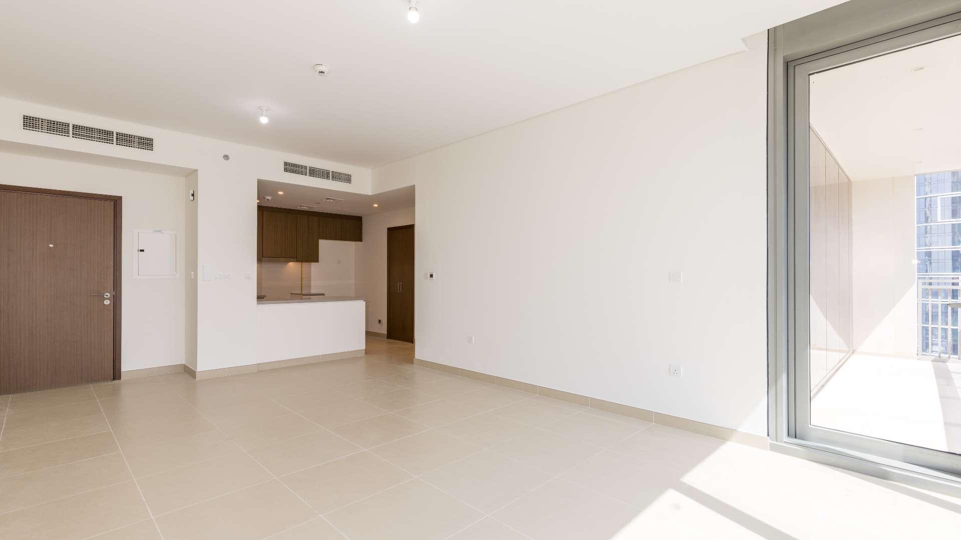 "Stunning view from brand new Dubai Marina apartment, 5242 sub-community, featuring high-rise buildings.",Bright living area in brand new 2-bedroom Marina apartment, Dubai Marina, 5242 sub-community