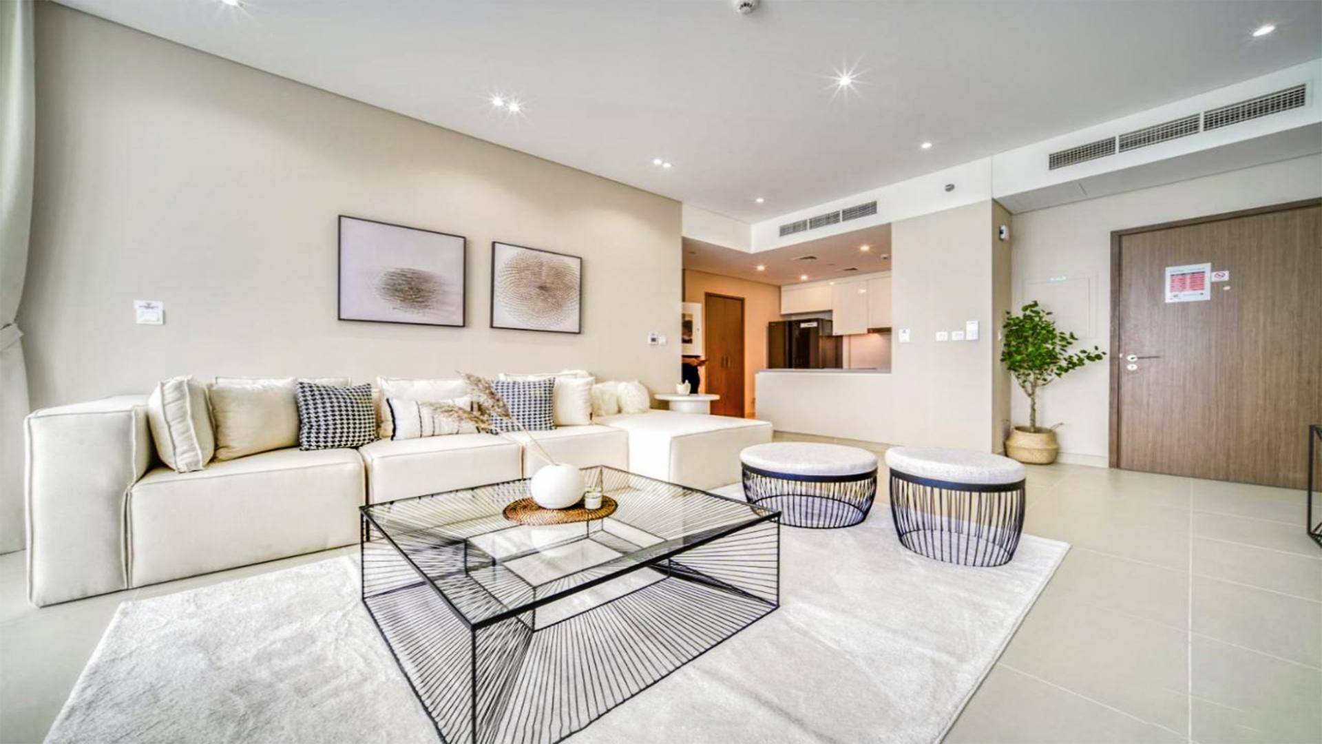 N/A,Modern furnished living room in renovated Dubai Marina apartment, chiller free, sea views