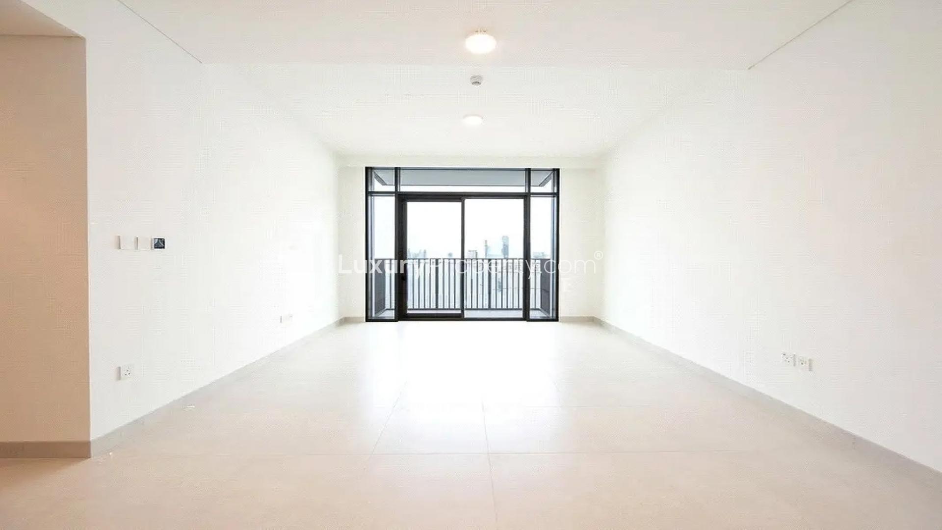 Bright living room with large windows in 2-bedroom apartment, Creek Crescent, Dubai Creek Harbour