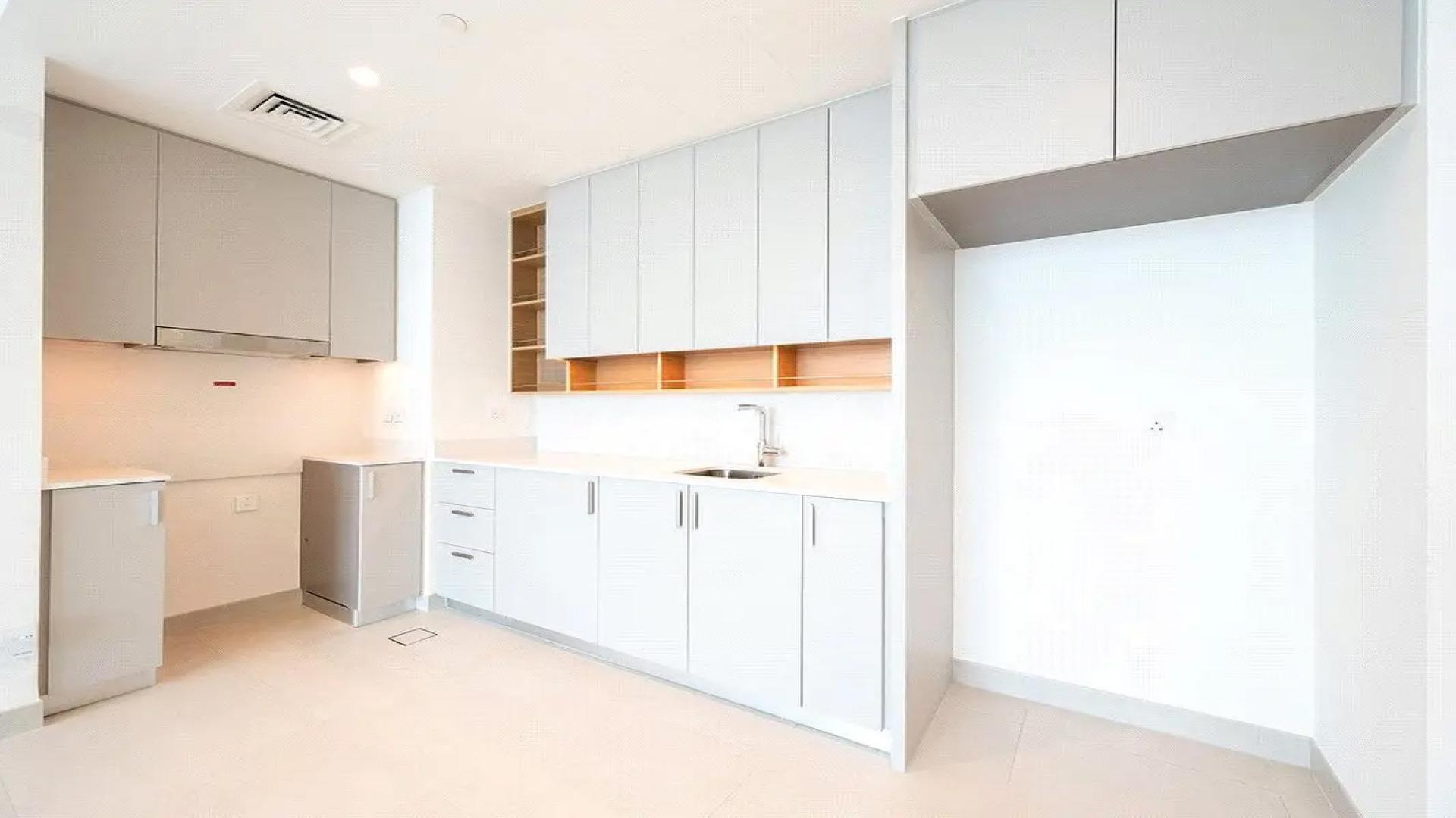 Spacious living room with skyline view in Dubai Creek Harbour apartment for rent