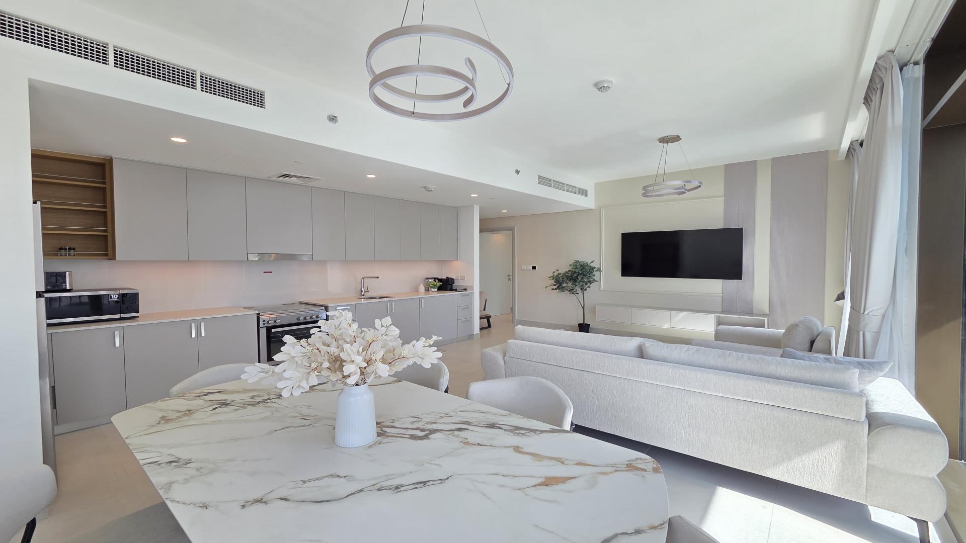 High-floor, fully furnished living area in Dubai Creek Harbour apartment, Creek Crescent