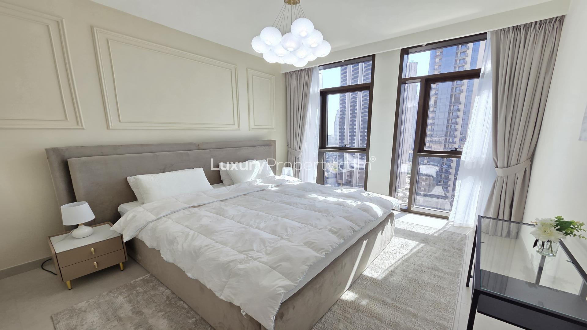 High-floor furnished apartment living area with modern kitchen in Dubai Creek Harbour