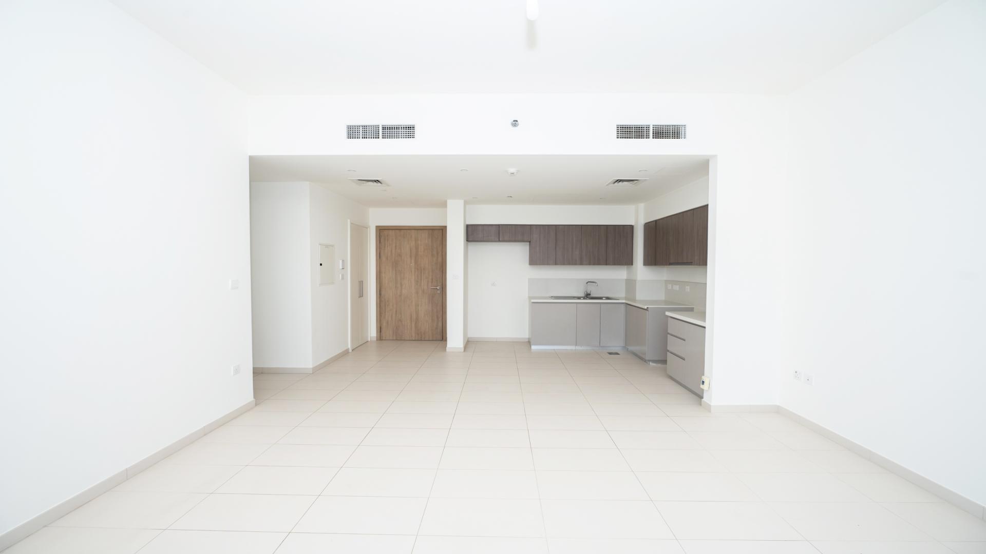 Aerial view of pool and garden in Park Ridge Tower C, Dubai Hills Estate apartment