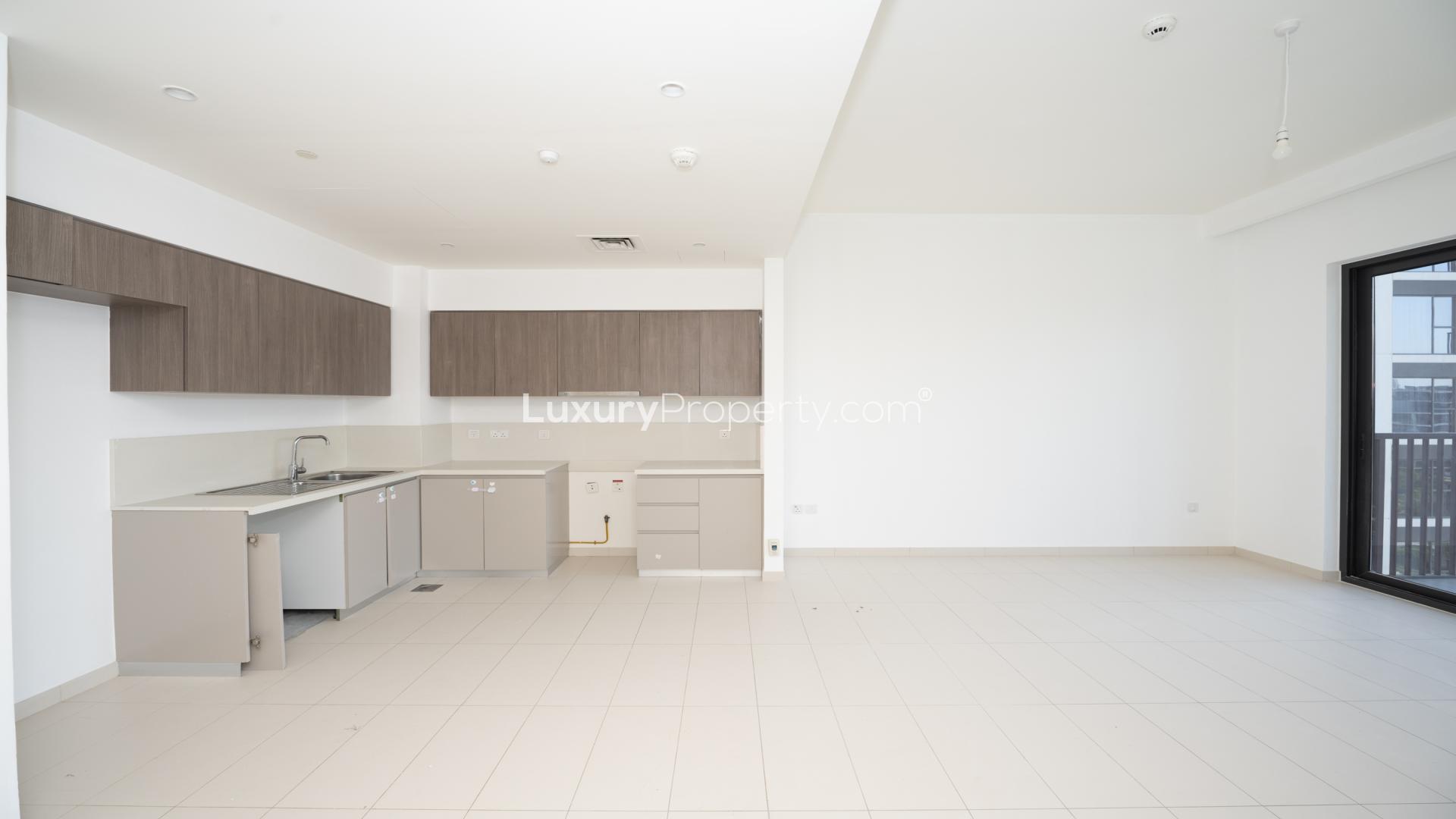 Modern kitchen and living area in 2-bedroom apartment, Park Ridge Tower C, Dubai Hills Estate