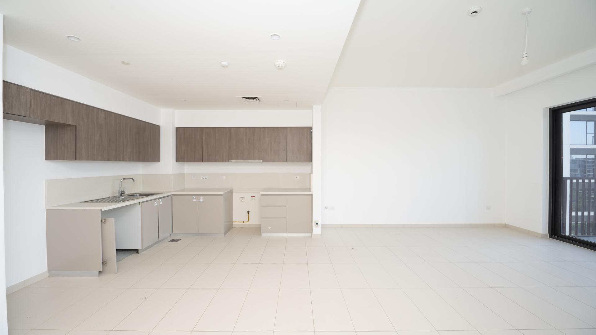 Modern kitchen and living area in 2-bedroom apartment, Park Ridge Tower C, Dubai Hills Estate