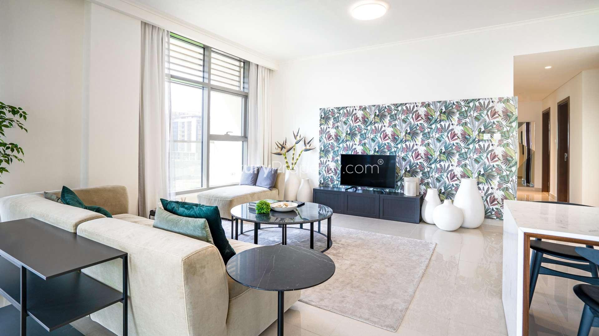 Elegant open-plan kitchen and living area in Acacia apartment, Dubai Hills Estate