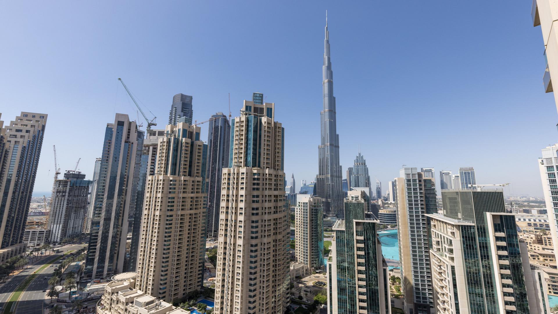 Modern living room in stylish two-bed apartment, Vida Residence Downtown Dubai