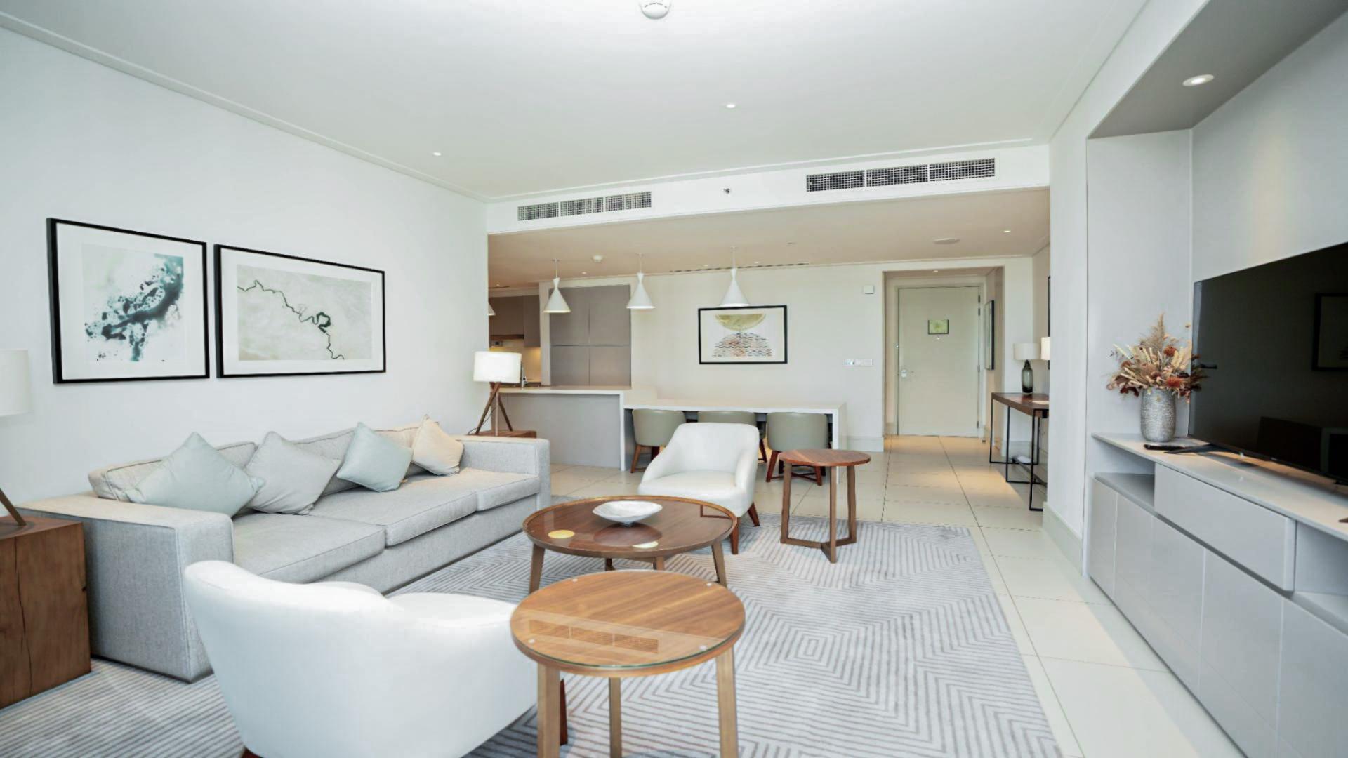 Fully furnished living room in 2-bedroom apartment, Vida Residence Downtown Dubai, modern decor