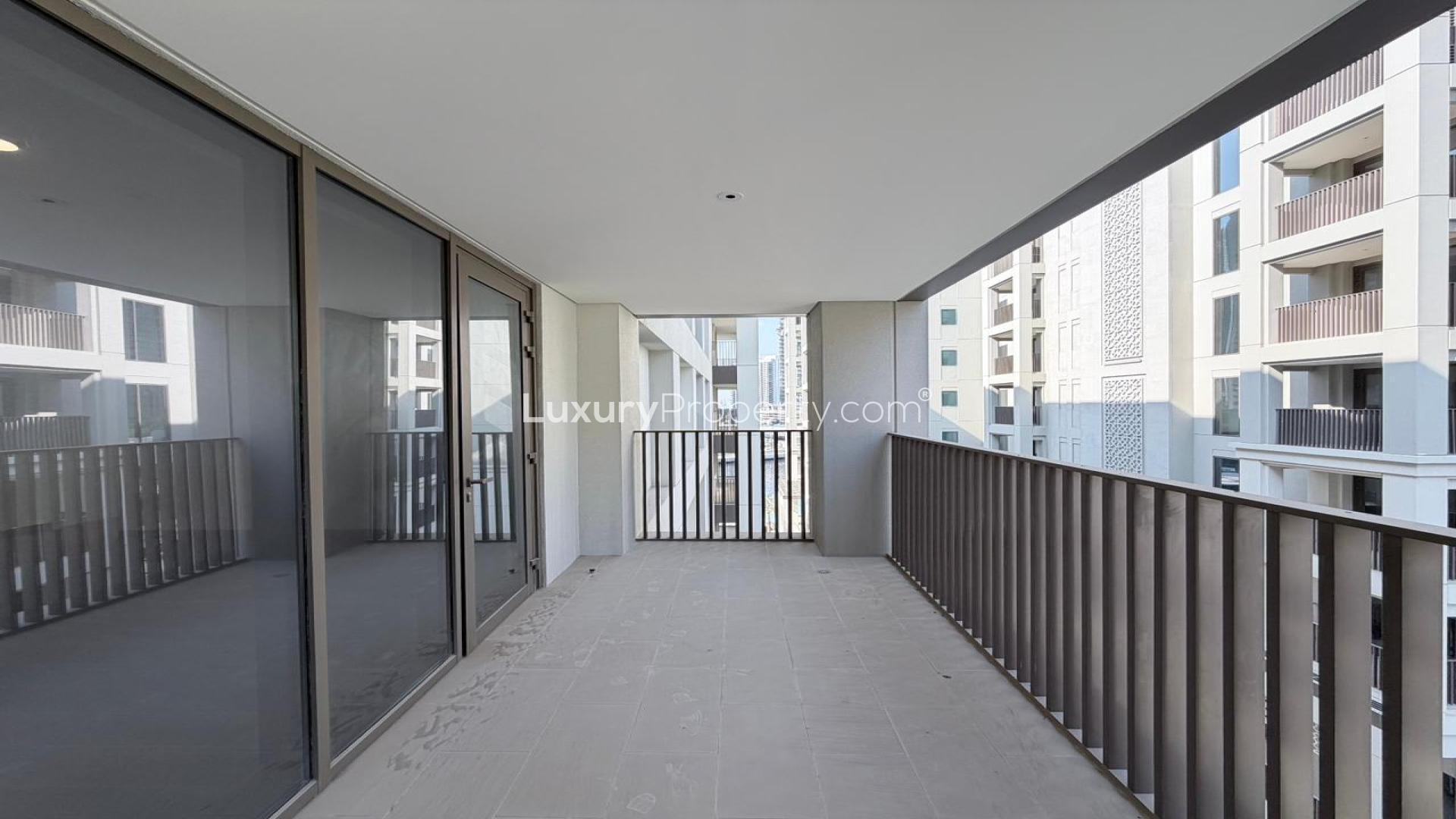 Spacious living area with large windows in Dubai Creek Harbour apartment for rent