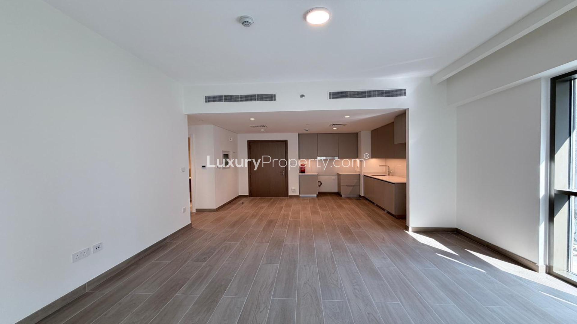 Modern open-plan living area in Grove at Creek Beach apartment, Dubai Creek Harbour