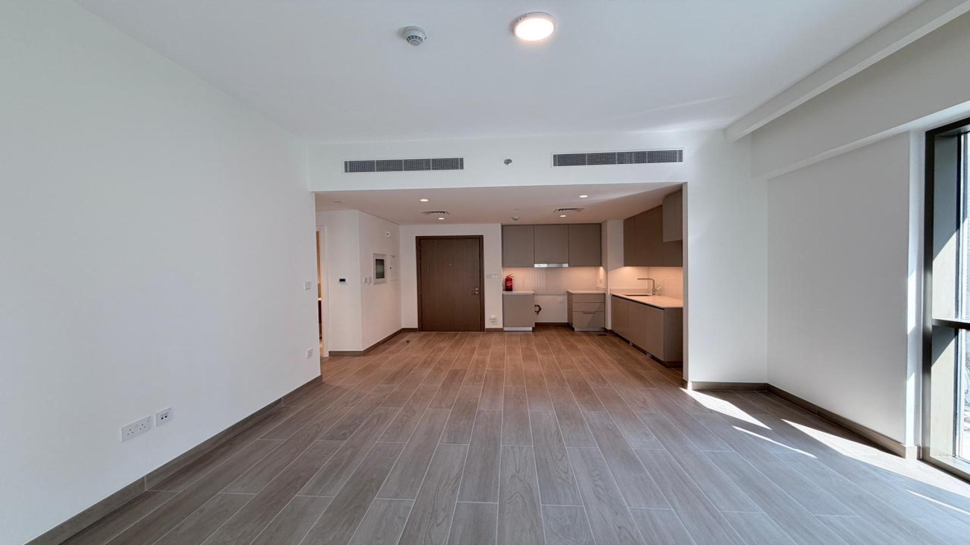 Modern open-plan living area in Grove at Creek Beach apartment, Dubai Creek Harbour