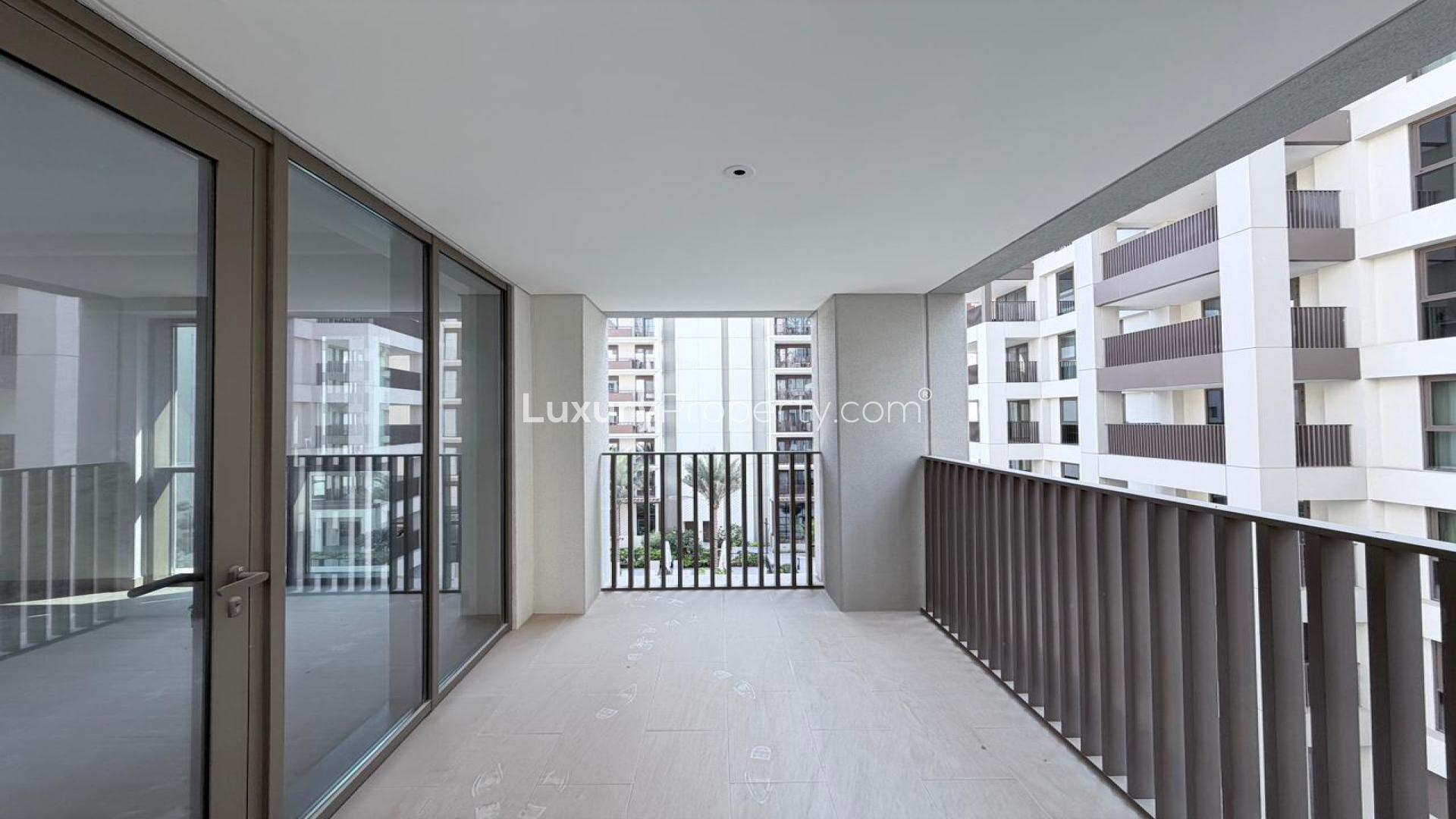 Modern kitchen and living area in Dubai Creek Harbour apartment for rent