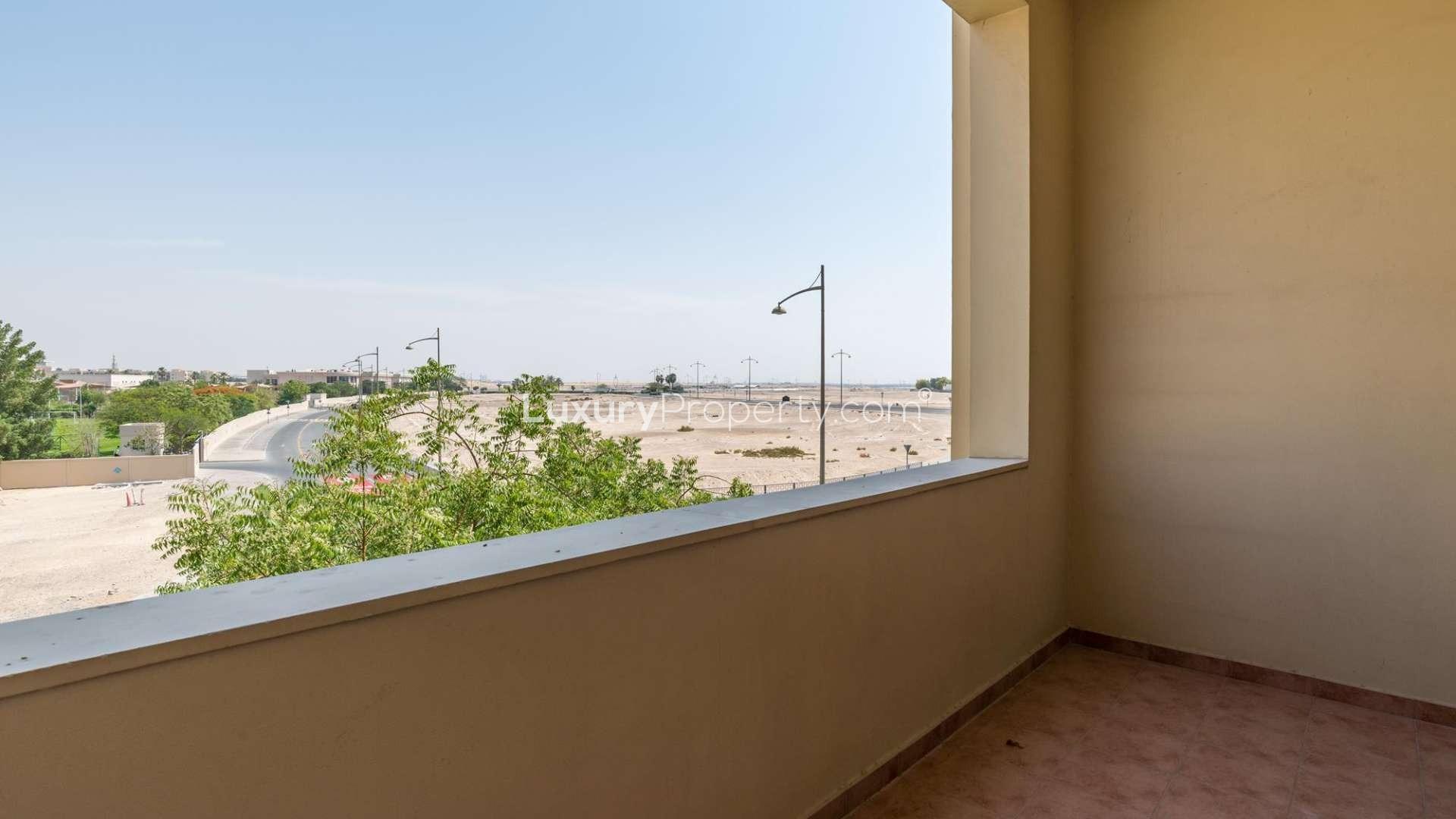 Spacious living room with large windows in Al Badia Residences apartment, Dubai Festival City