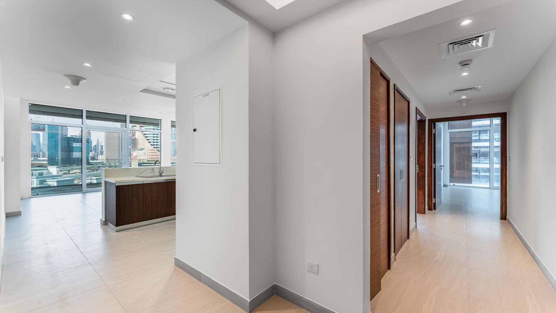 Unfurnished corner apartment with spacious living area and modern kitchen in Park Gate Residences