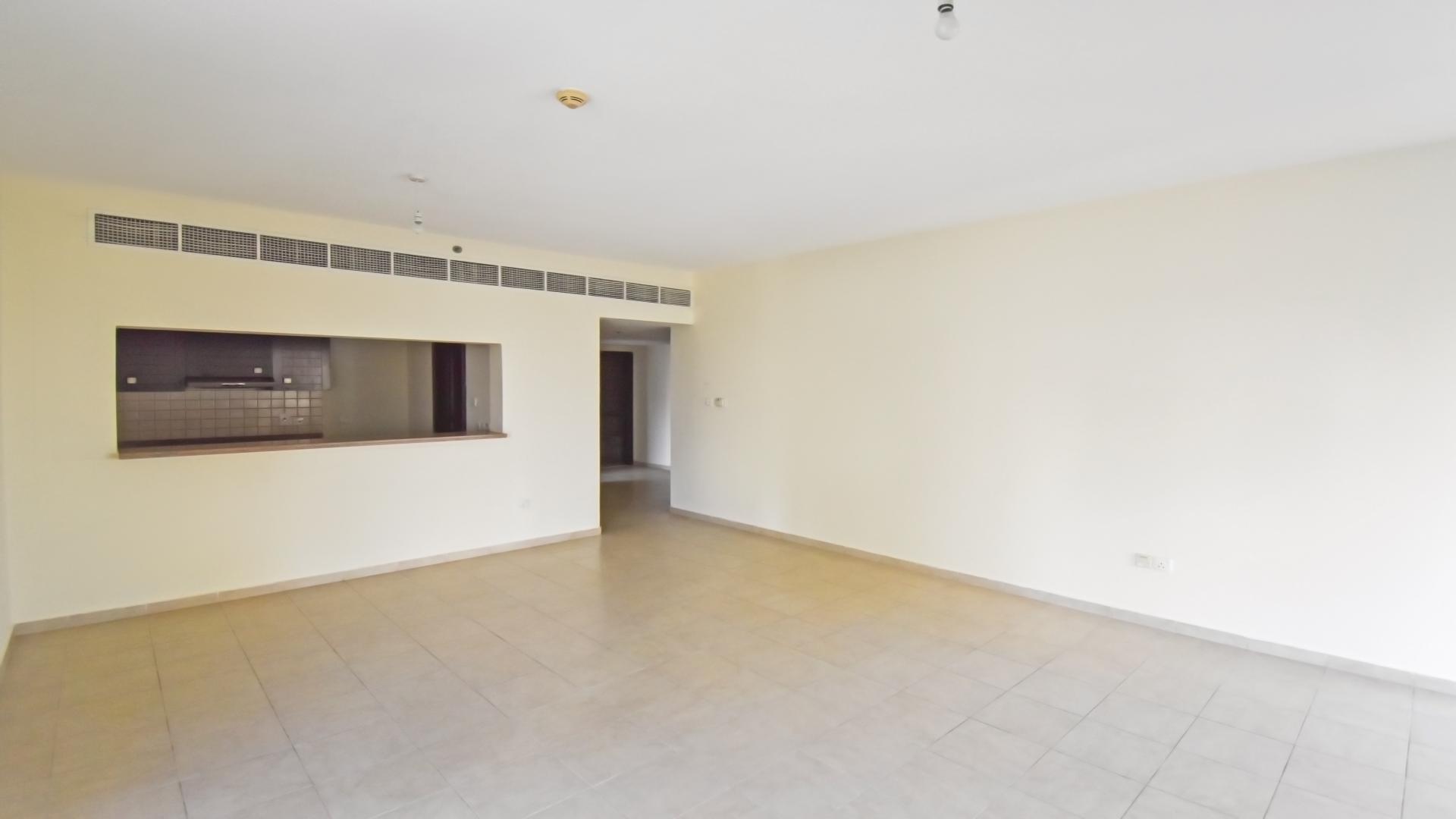 Empty living room in modern two-bedroom apartment, Al Habtoor Tower, Business Bay