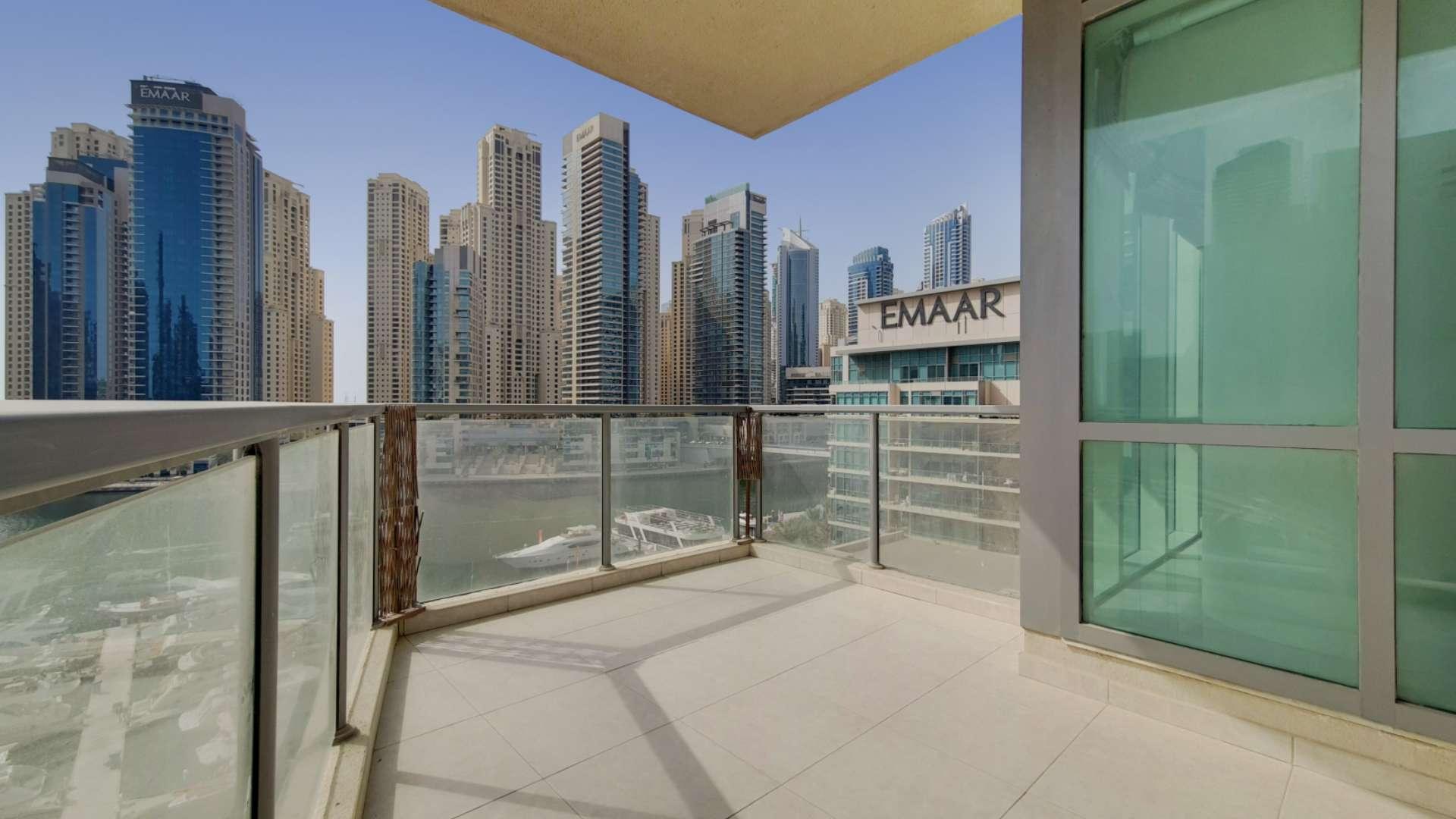 Stunning view of Dubai Marina from Al Majara apartment, showcasing waterfront and skyscrapers