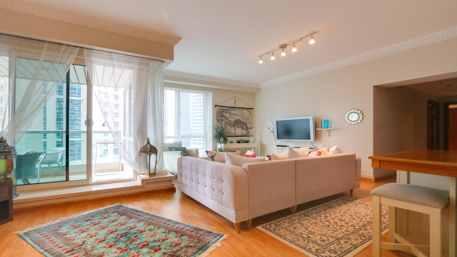 Furnished balcony with stunning view of Dubai Marina from Emaar 6 Towers apartment