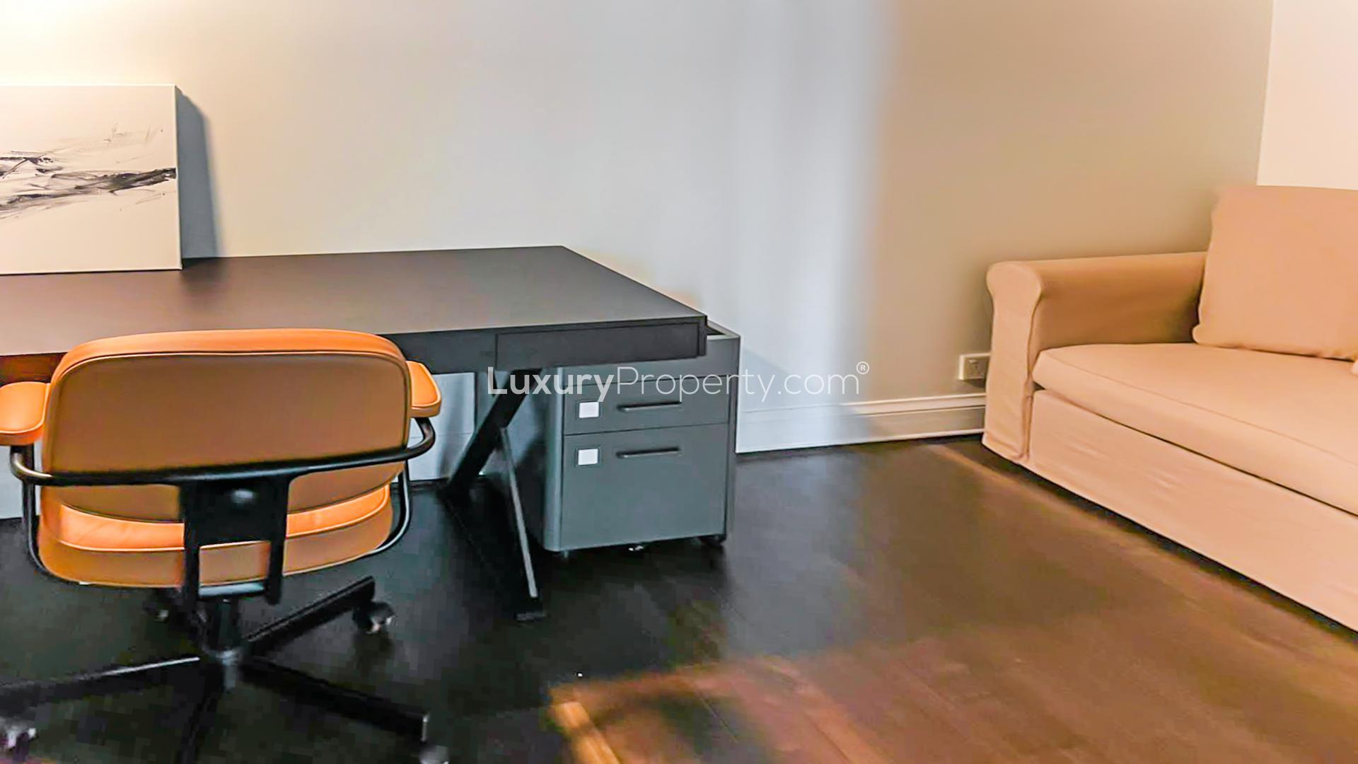 Furnished living room in Dubai Marina apartment, Emaar 6 Towers, modern decor with TV