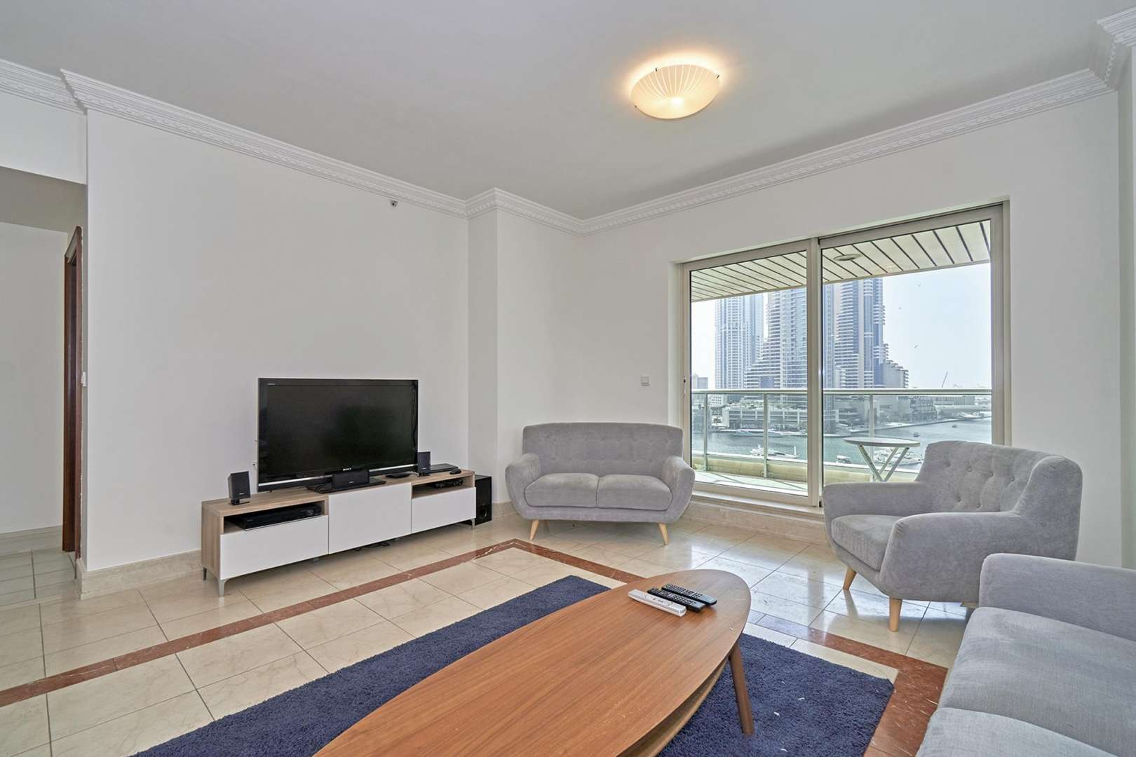 Furnished living room with marina view in 2-bedroom apartment, Emaar 6 Towers, Dubai Marina