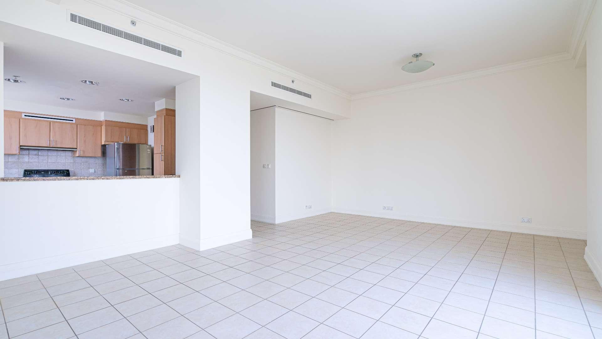 Modern kitchen with wooden cabinets in two-bedroom apartment, Murjan Towers, Dubai Marina