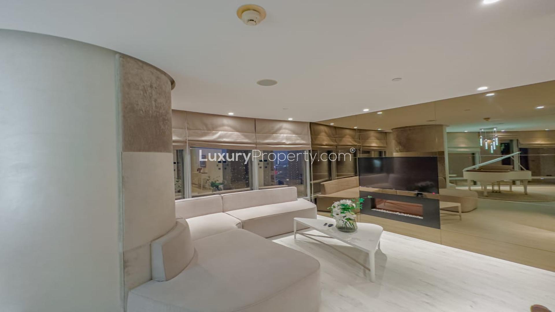 Luxurious living room with grand piano in Burj Khalifa apartment, Downtown Dubai