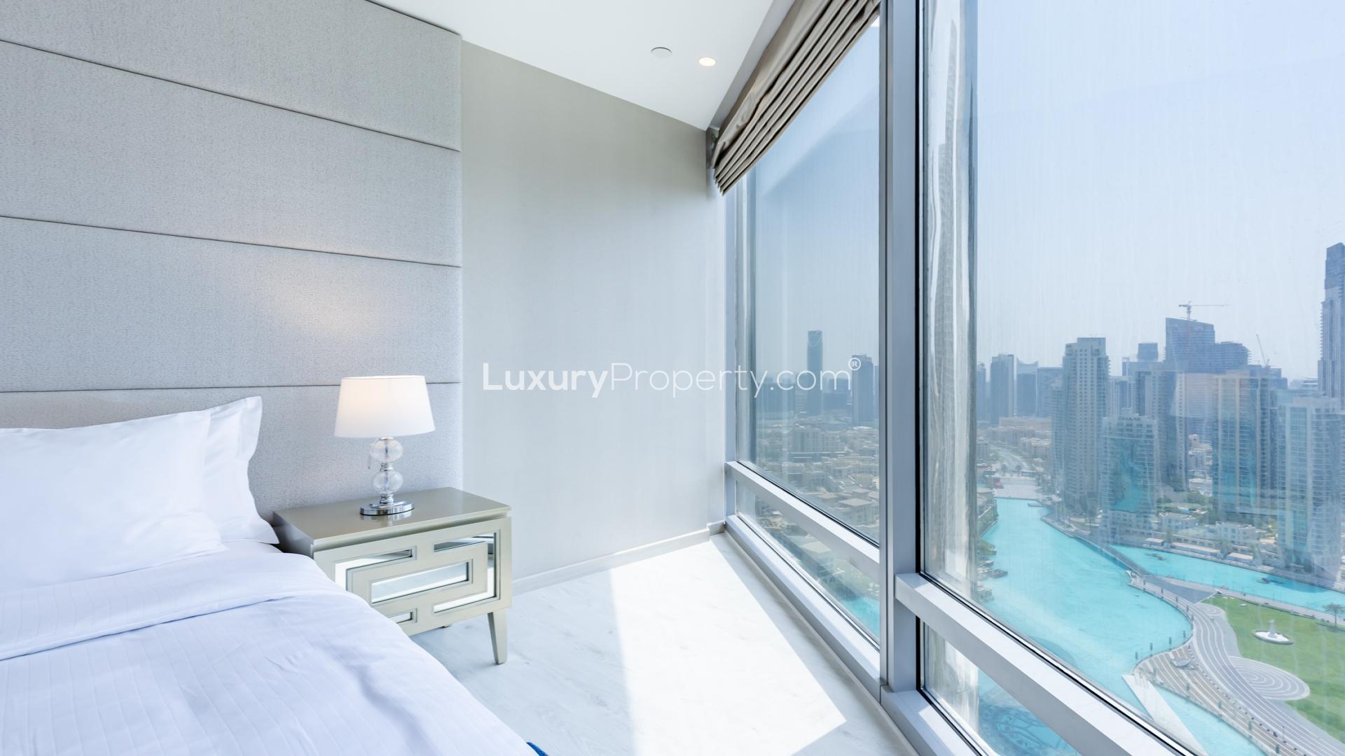 Luxurious Burj Khalifa apartment interior with grand piano and panoramic skyline views