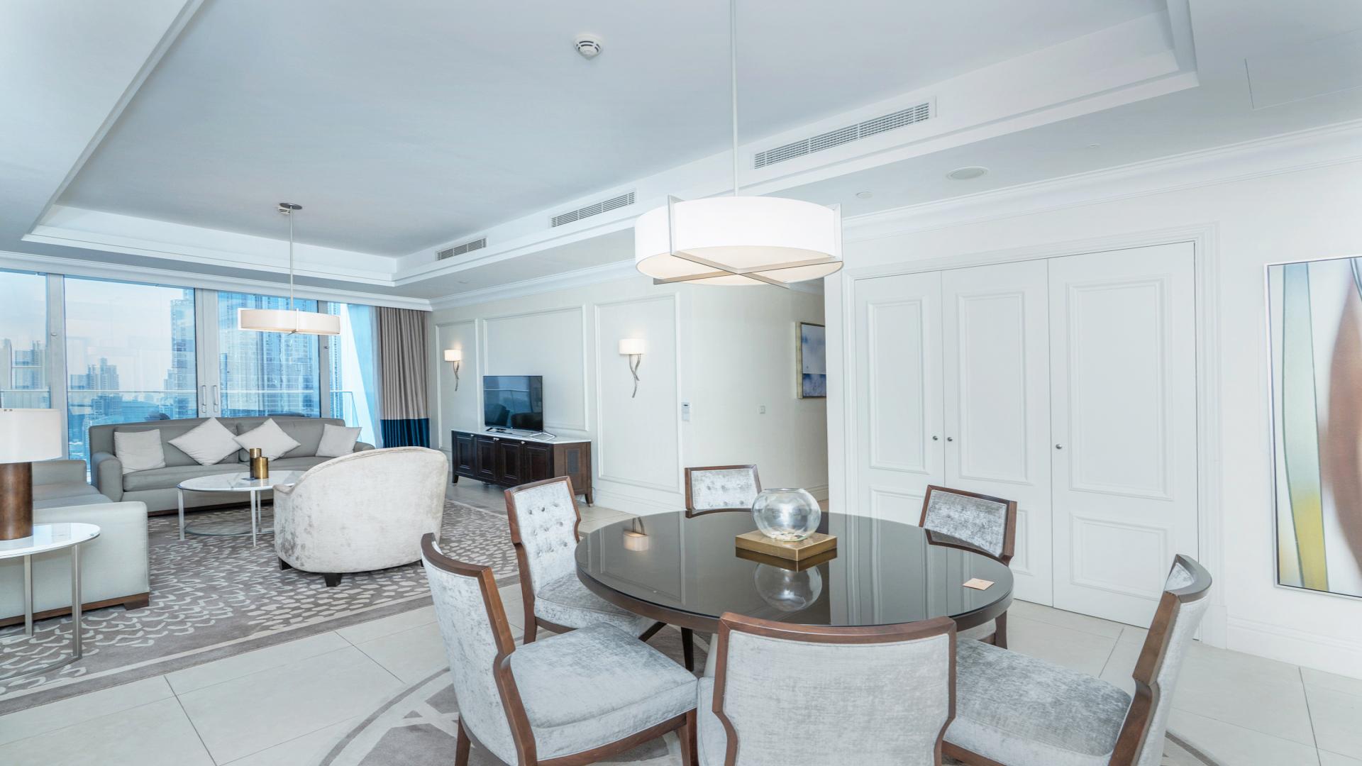 Furnished living and dining area in 2-bedroom apartment, The Address The BLVD, Downtown Dubai