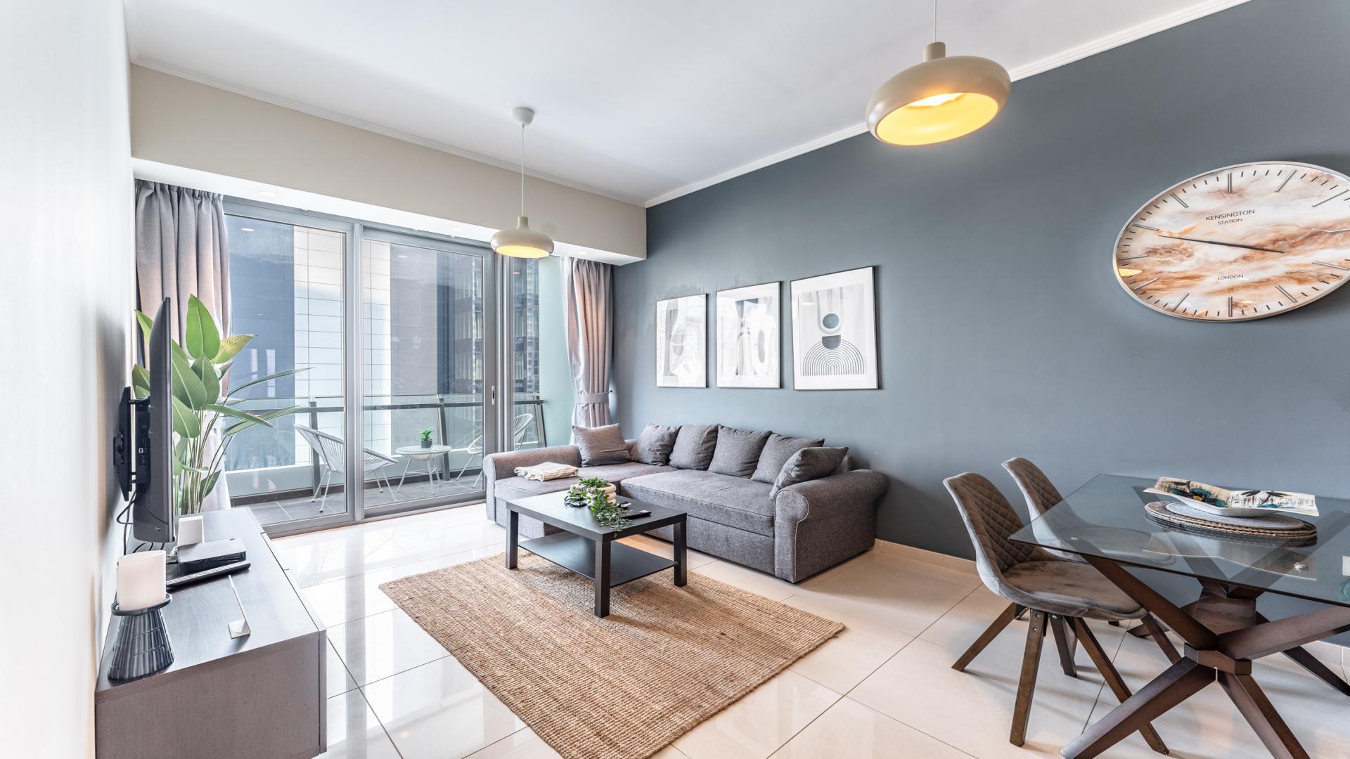 Modern living room in 2-bedroom furnished apartment