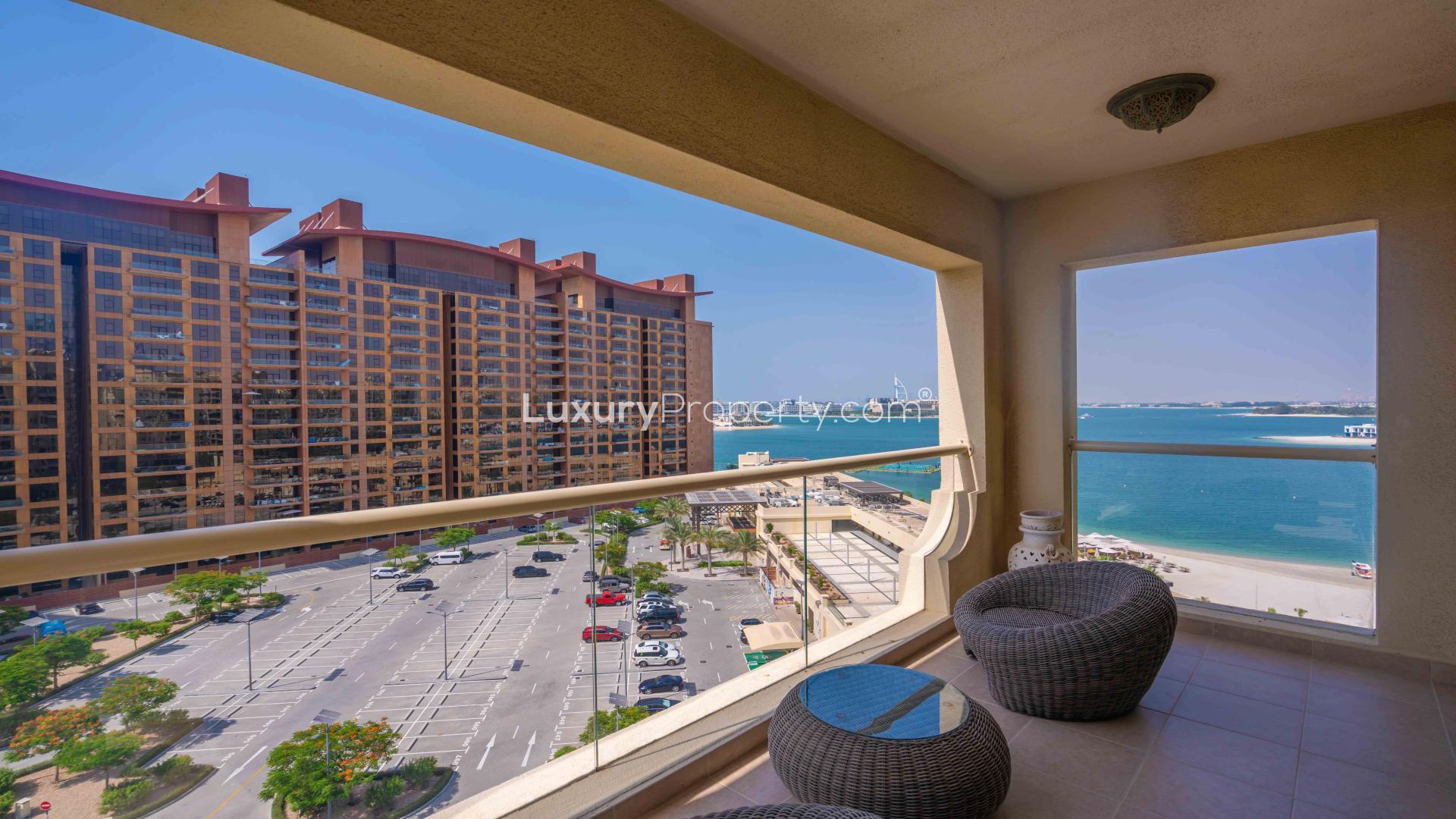 Modern living room in Shoreline beachfront apartment, Palm Jumeirah, with stylish decor and balcony