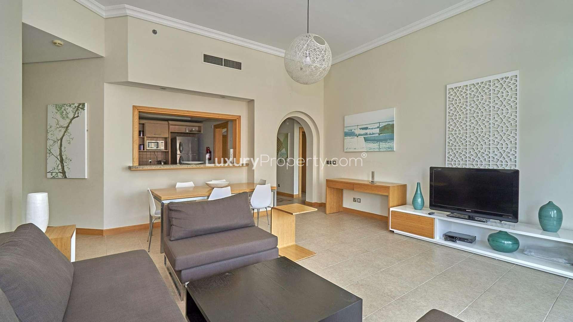 Furnished living room in Shoreline Apartments, Palm Jumeirah, with sea view and modern decor