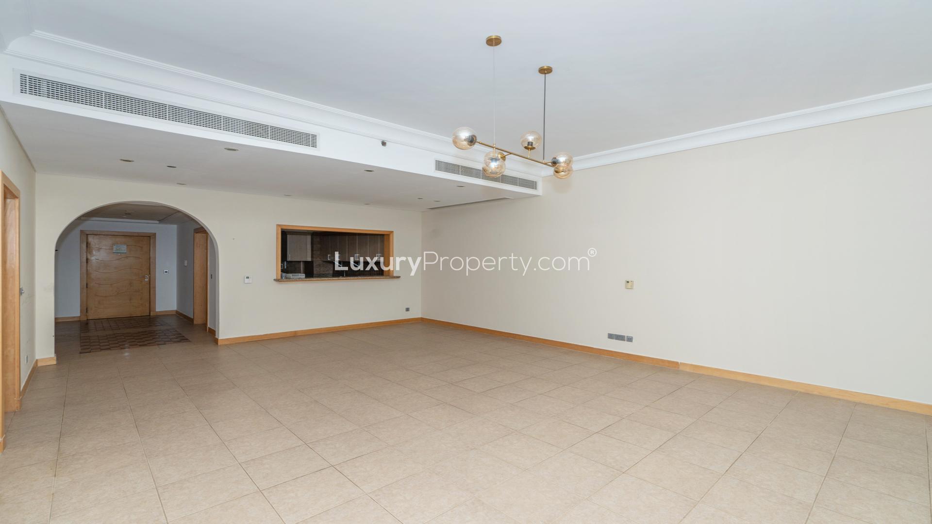 Spacious balcony view from Al Tamr Apartment, Palm Jumeirah, overlooking cityscape and beach