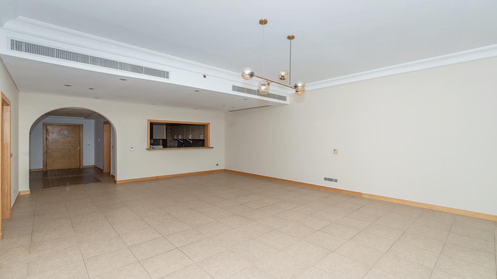 Spacious balcony view from Al Tamr Apartment, Palm Jumeirah, overlooking cityscape and beach