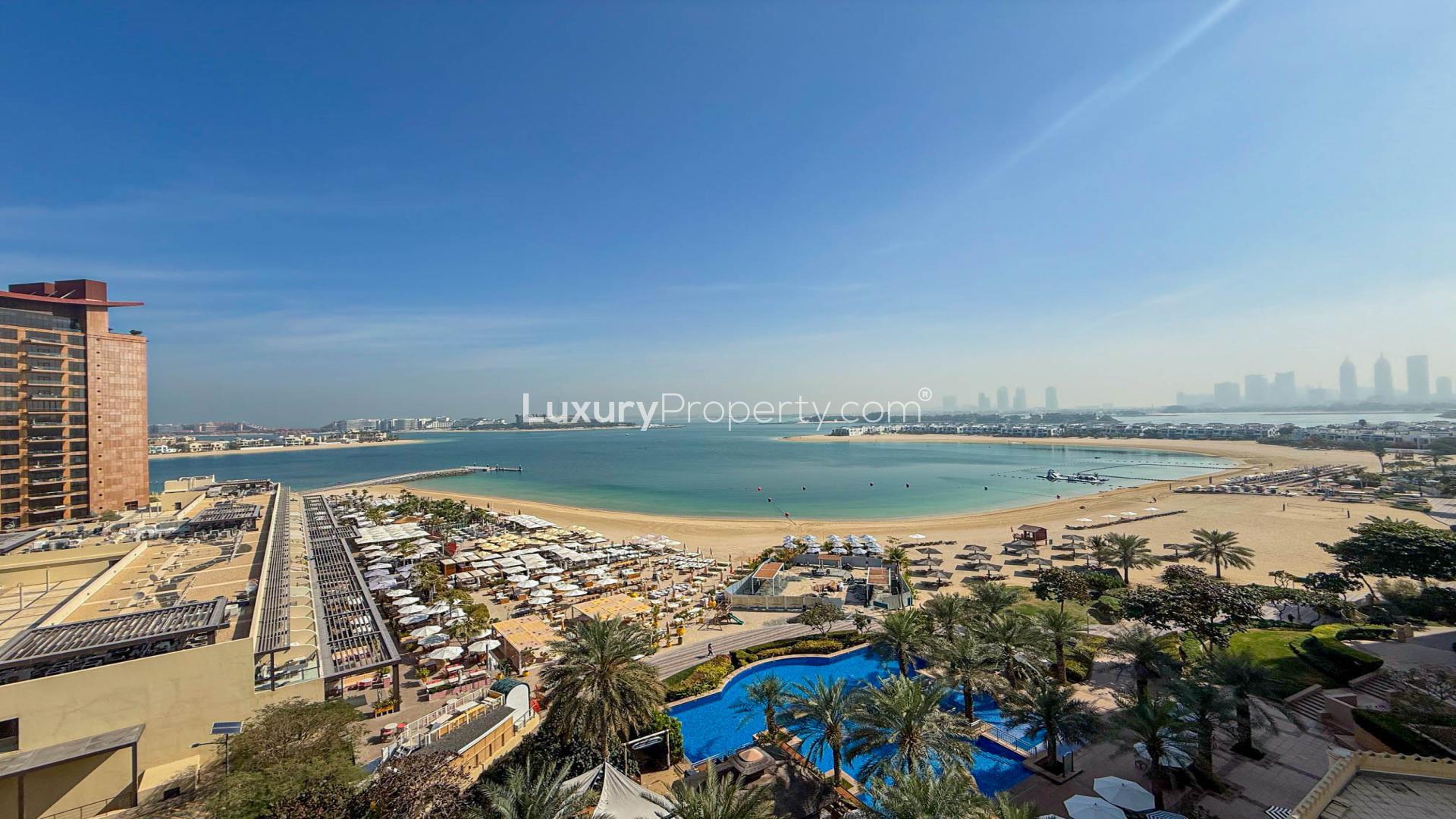 Balcony view of beach and sea at Shoreline Apartments, Palm Jumeirah, available for rent
