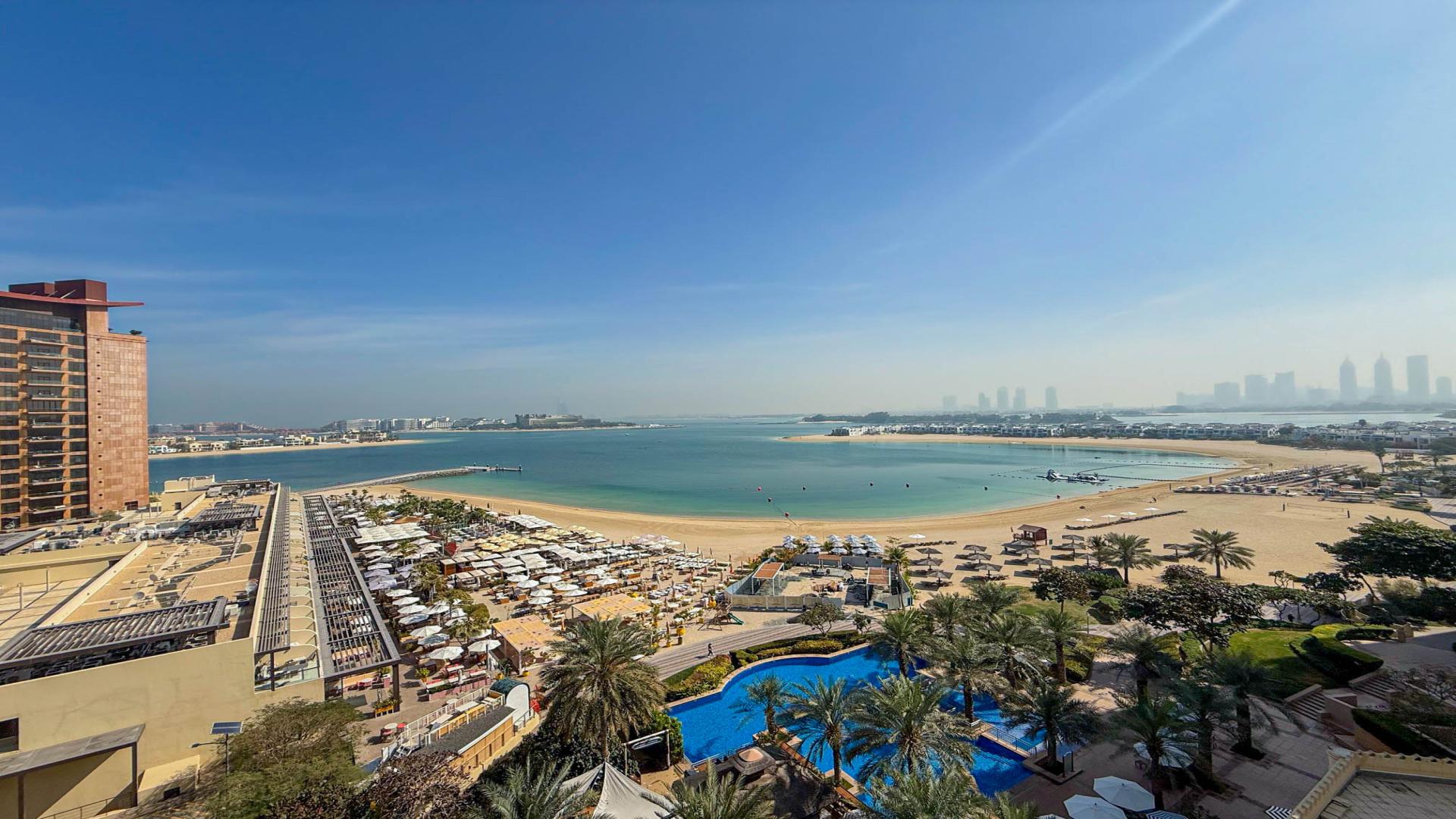 Balcony view of beach and sea at Shoreline Apartments, Palm Jumeirah, available for rent