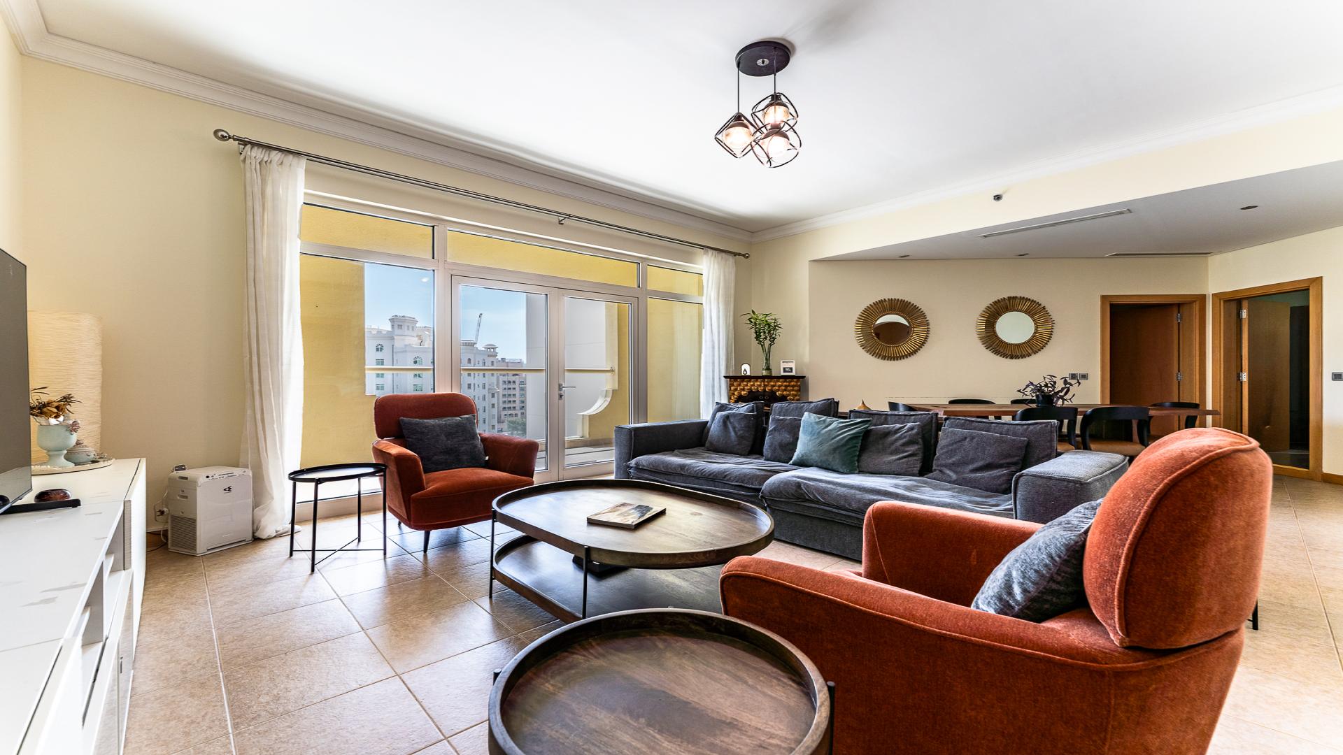 Aerial view of Shoreline Apartments, Palm Jumeirah, showcasing luxury residential buildings and skyline