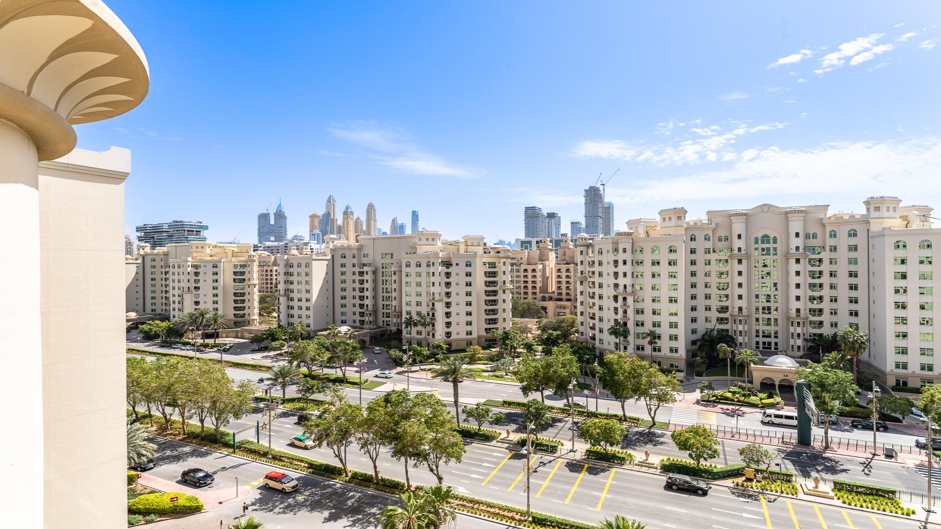 Spacious living room in Shoreline Apartments, Palm Jumeirah, with modern furnishings and natural light