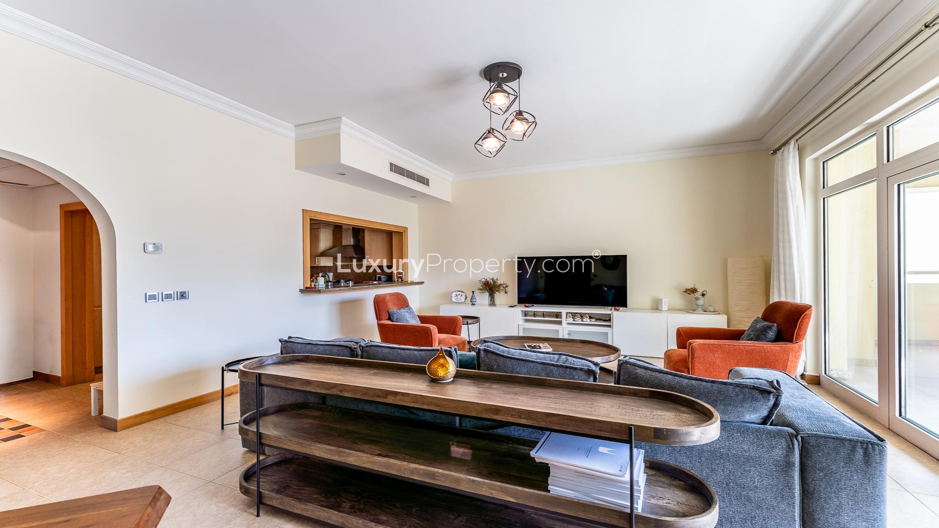 Spacious living room in Shoreline Apartments, Palm Jumeirah, with modern furnishings and natural light