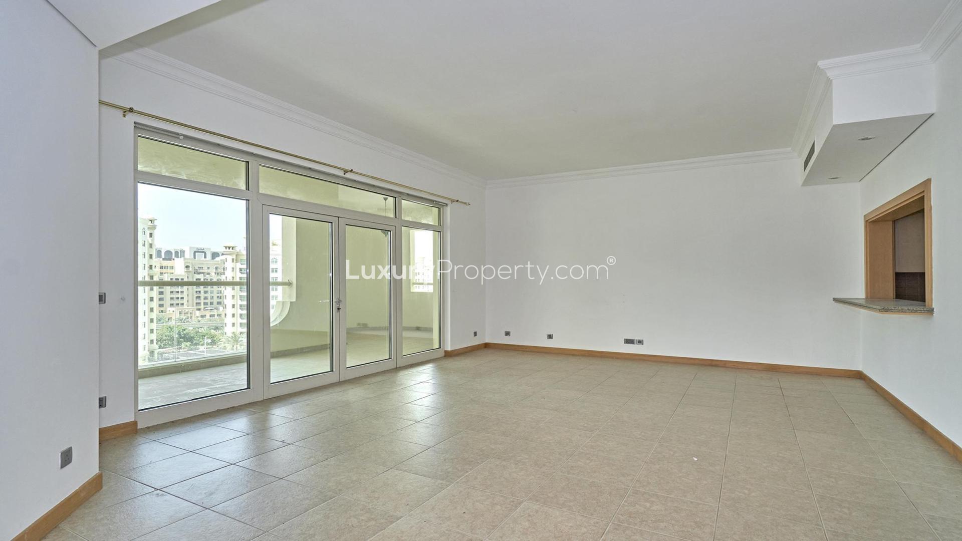 Palm Jumeirah Shoreline Apartments view, residential area with road and buildings, sunny day
