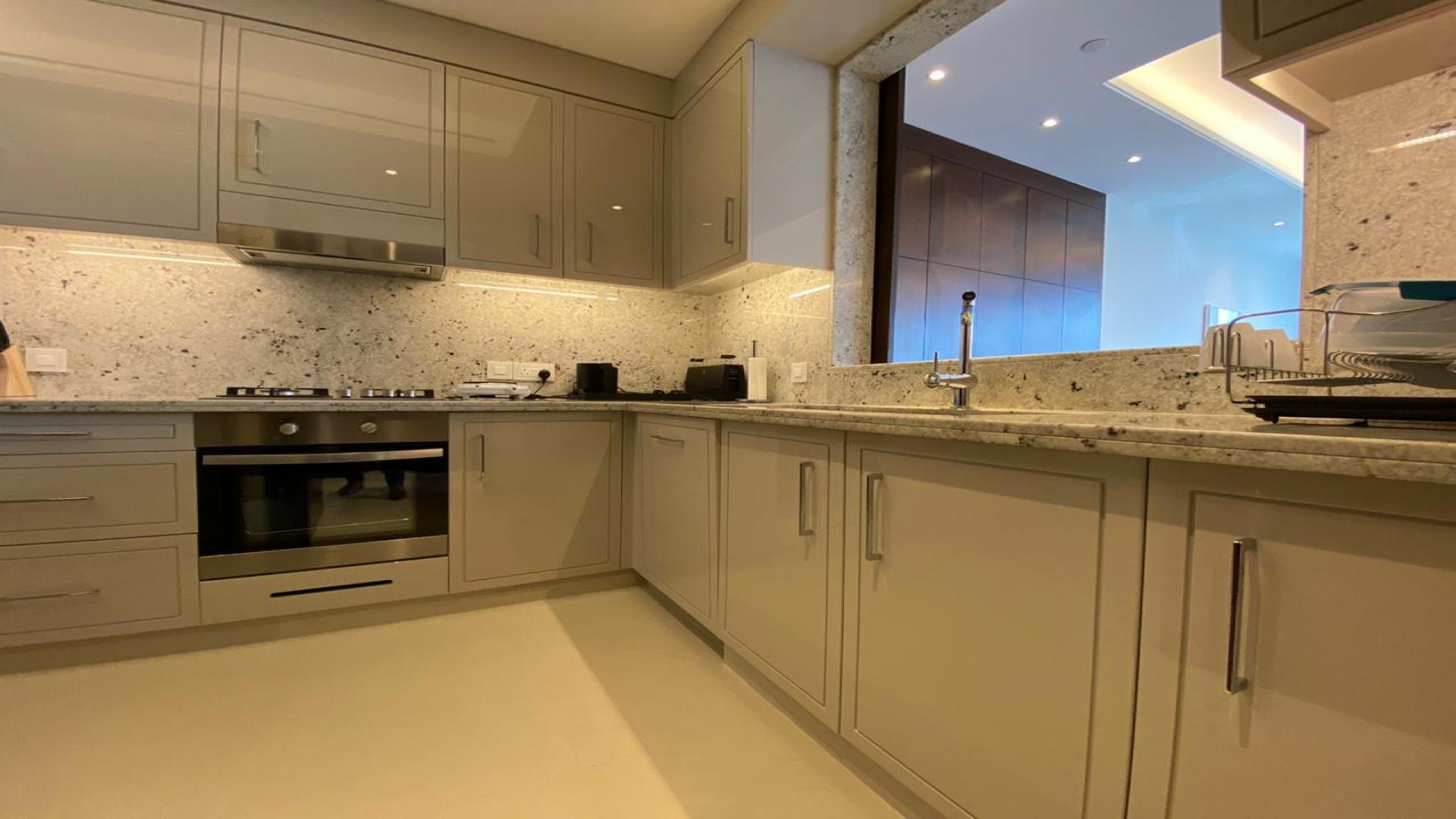Modern kitchen in furnished 2-bedroom apartment, The Address Sky View, Downtown Dubai