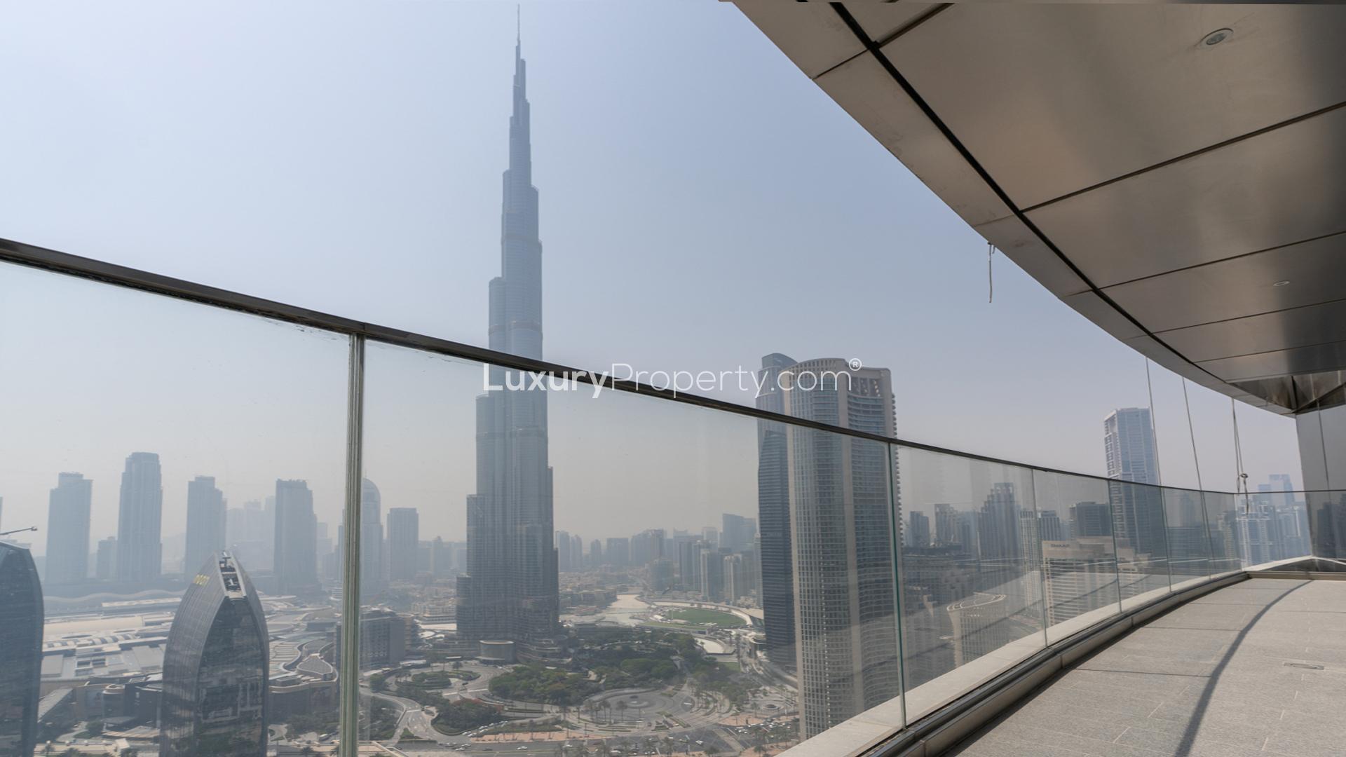 Furnished living room in high-floor apartment with city views, The Address Sky View Towers