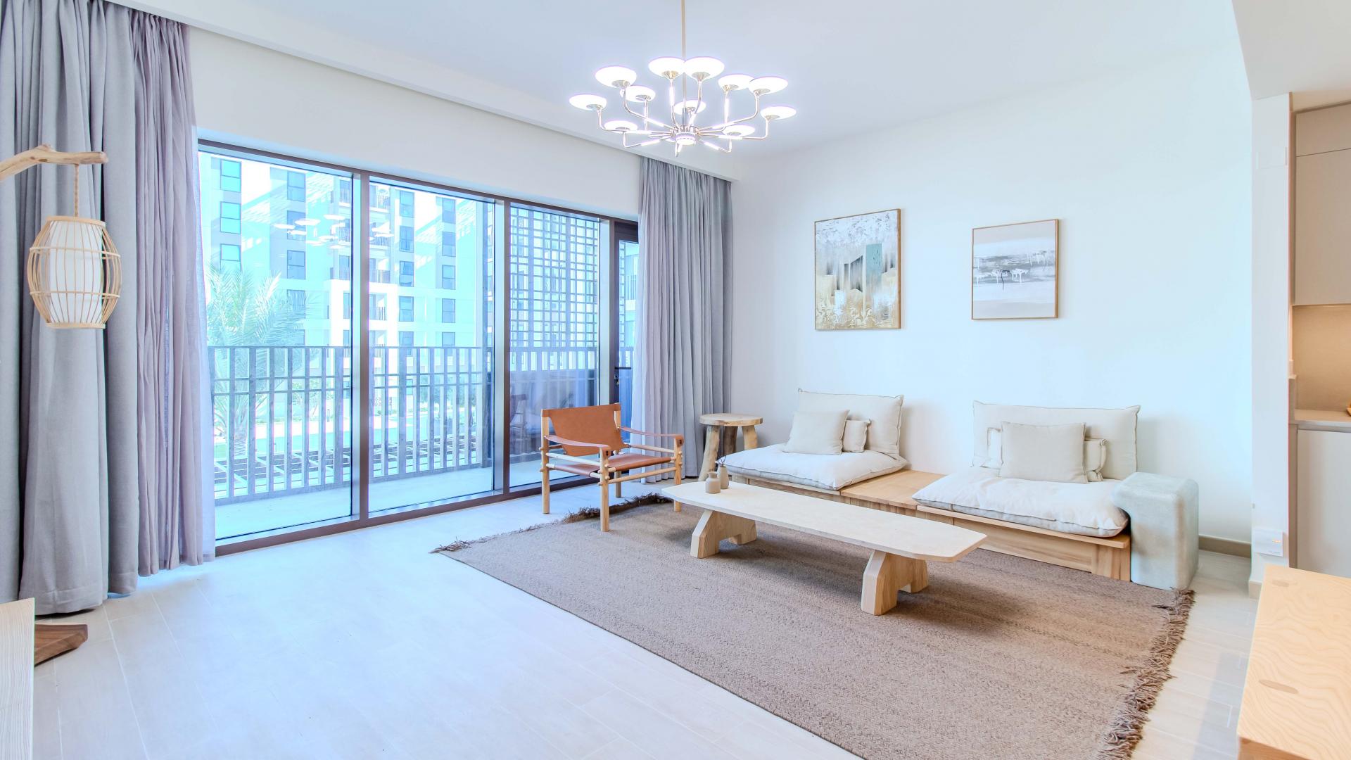 Furnished living and dining area in Creek Beach apartment, Dubai Creek Harbour, for rent