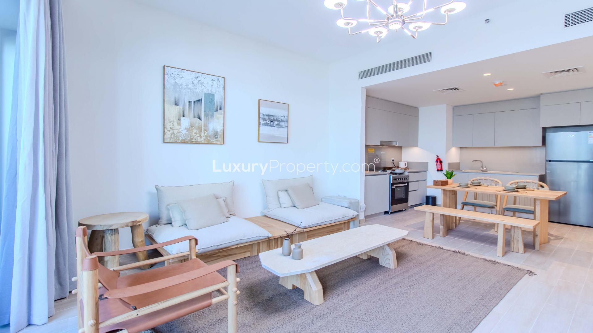 Furnished living area and kitchen in Creek Beach apartment, Dubai Creek Harbour, for rent