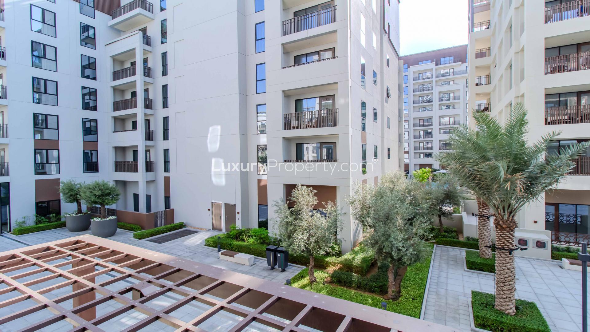 Modern furnished living and dining area in beachfront apartment, Dubai Creek Harbour