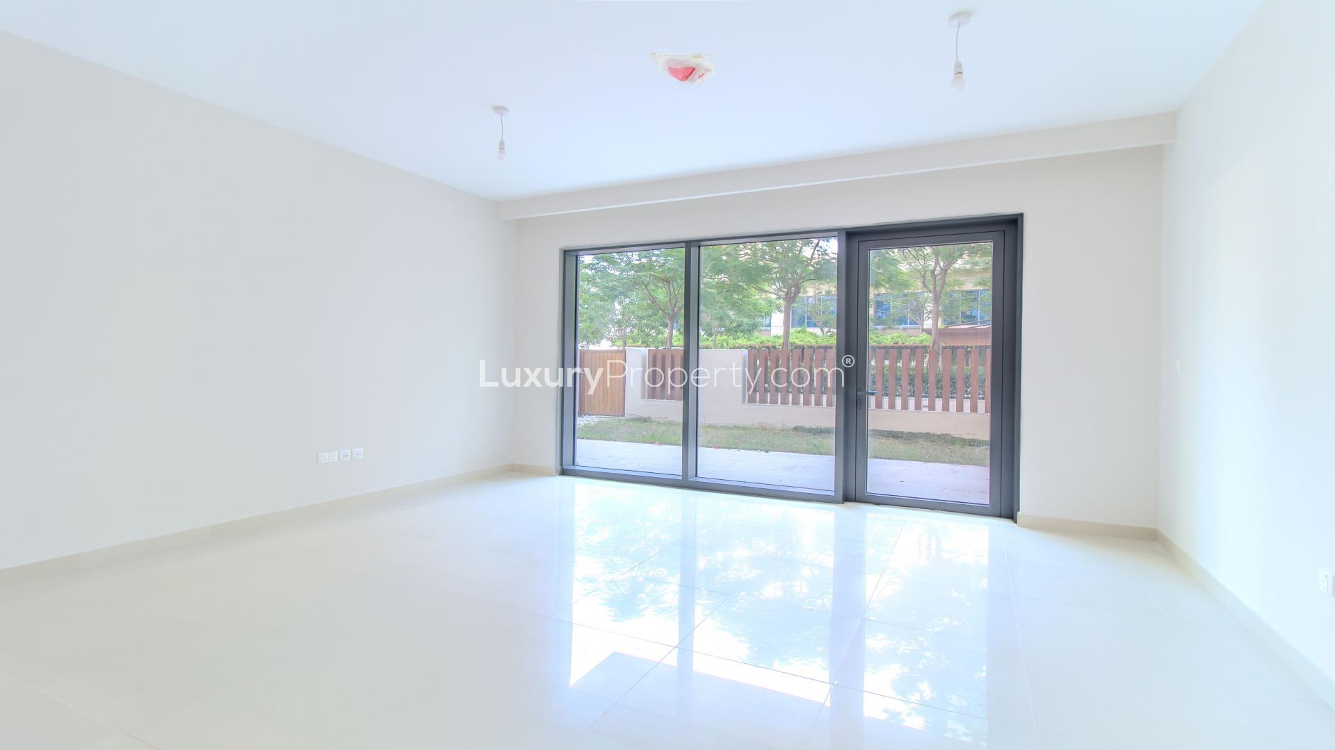 "Spacious living room with garden view in Dubai Creek Harbour apartment for rent.",Modern kitchen in two-bedroom apartment, Harbour Views 2, Dubai Creek Harbour, for rent