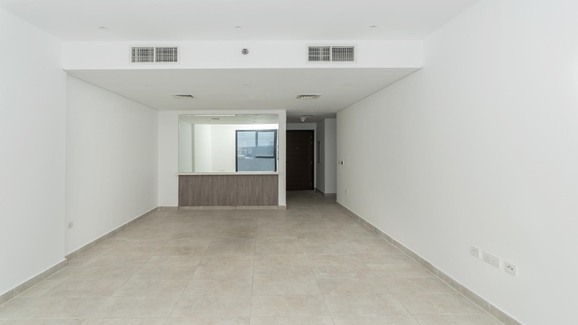 Empty living room in 2-bedroom apartment, Hyati Residences, Jumeirah Village Circle, for rent