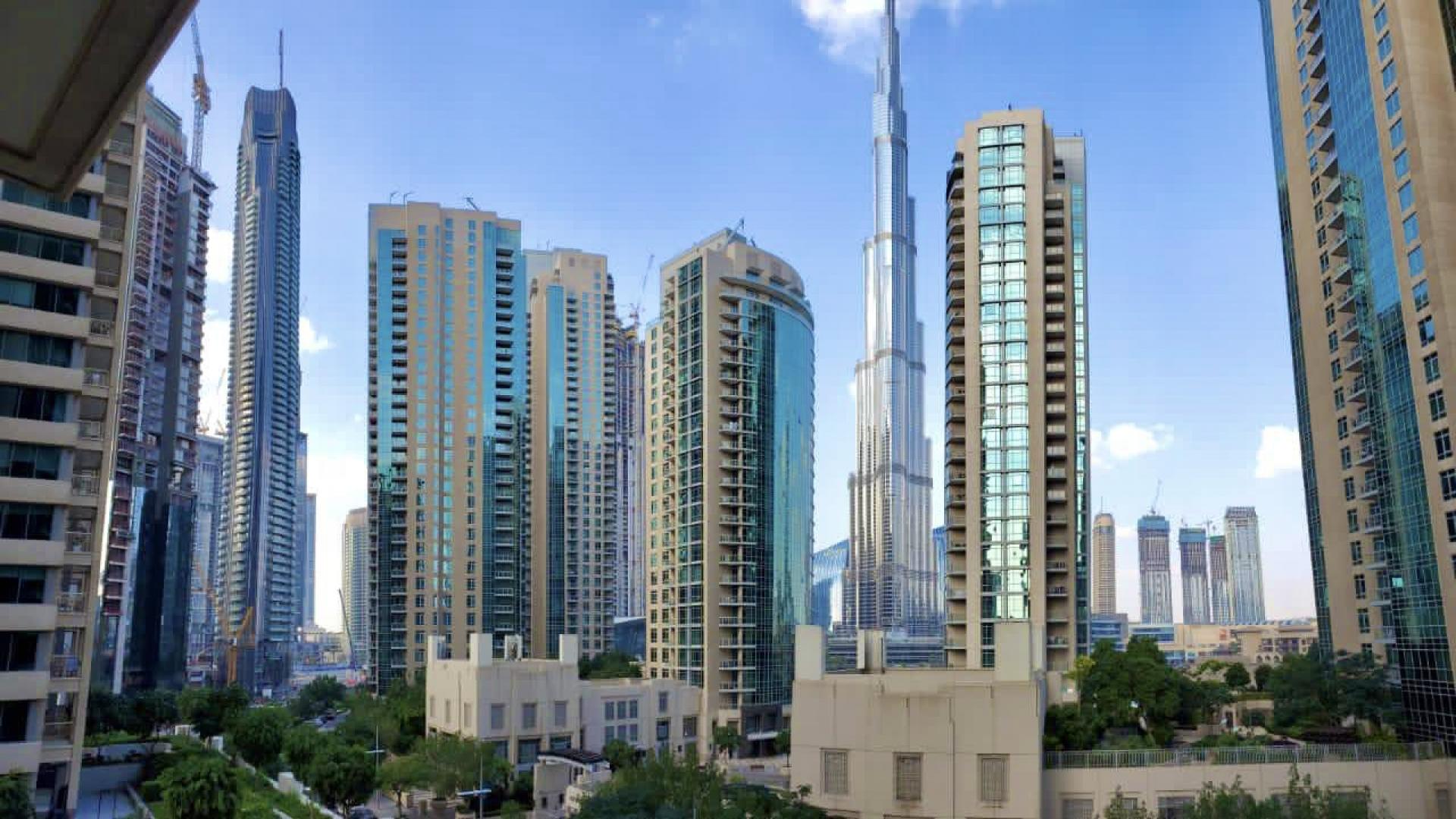 Spacious living room in Boulevard Central Towers apartment, Downtown Dubai with large windows